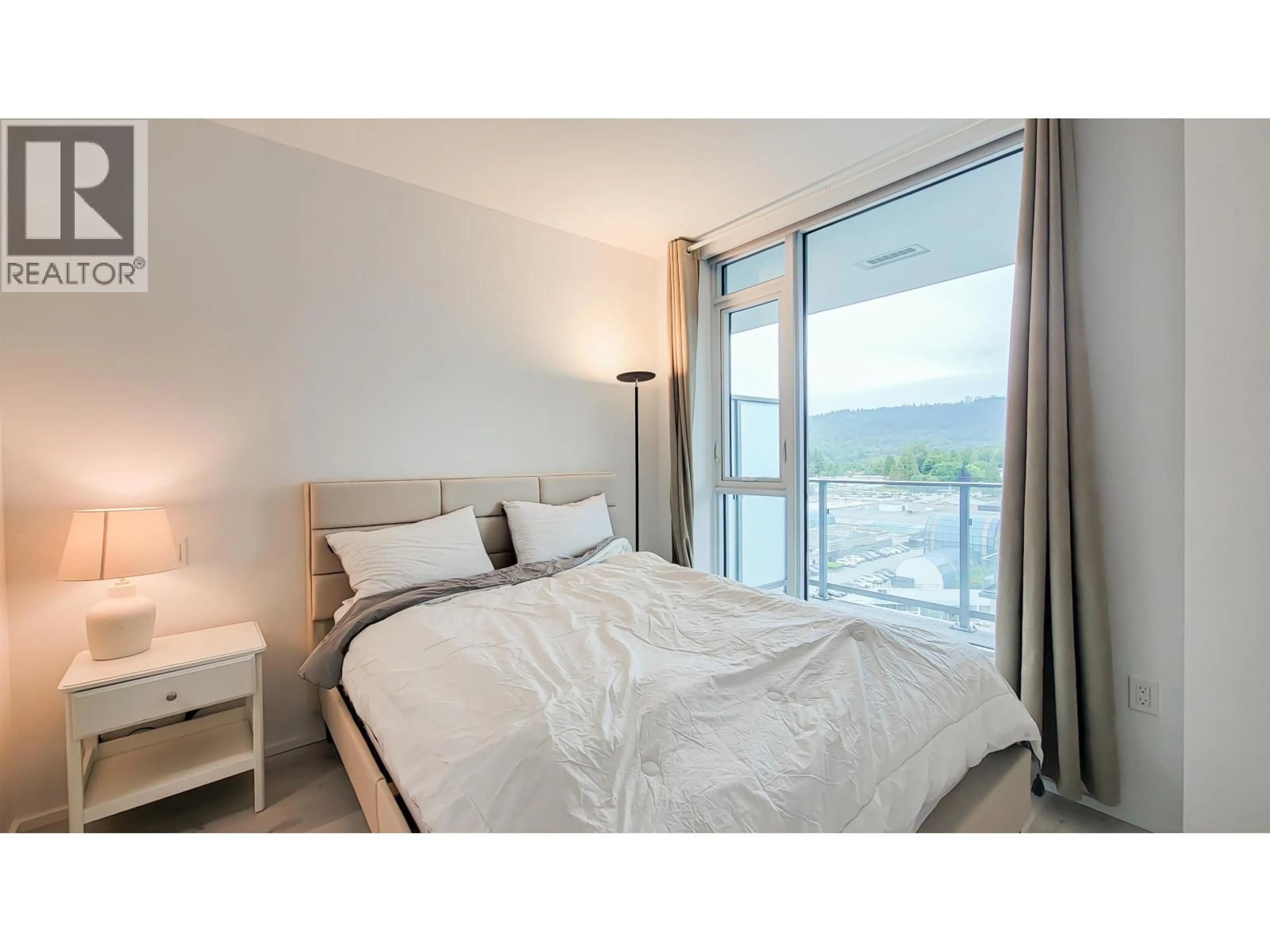 Bedroom with bed, unknown for 711 - 3833 EVERGREEN PLACE, Burnaby British Columbia V3J0M2