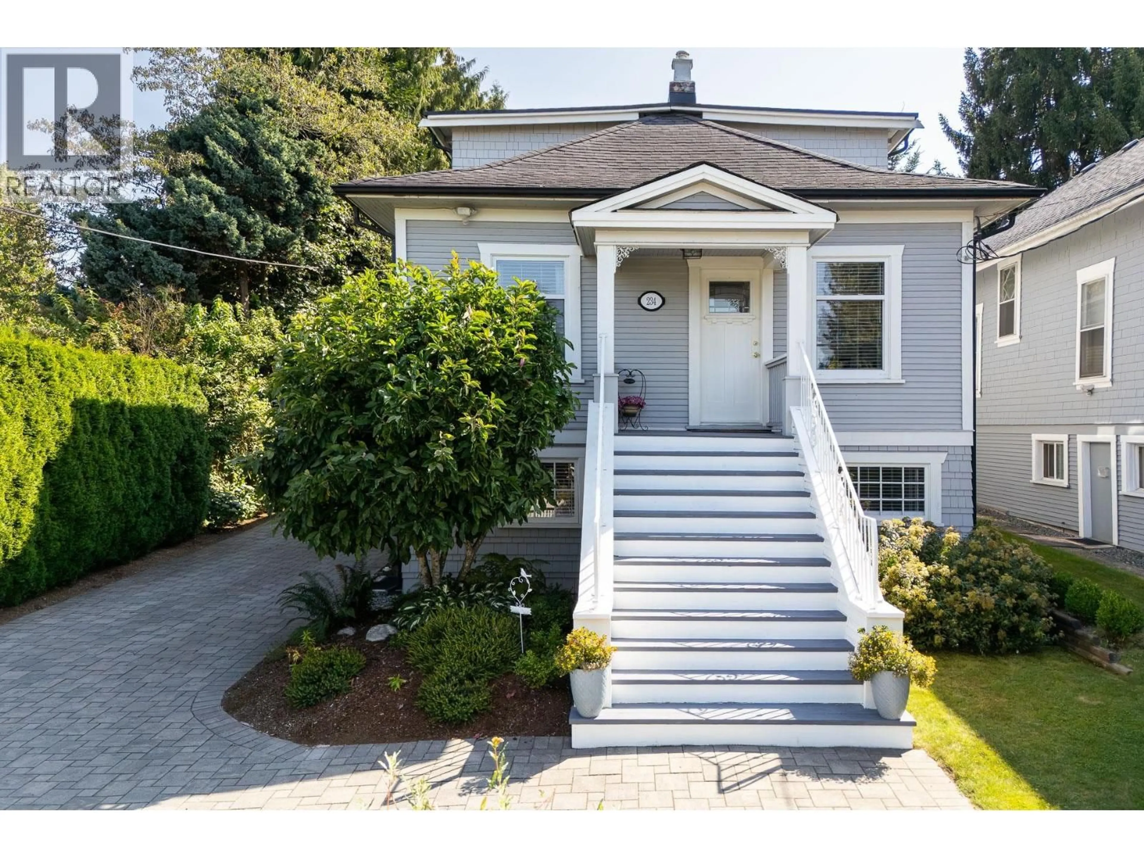 Home with vinyl exterior material, street for 234 EIGHTH AVENUE, New Westminster British Columbia V3L1Y2