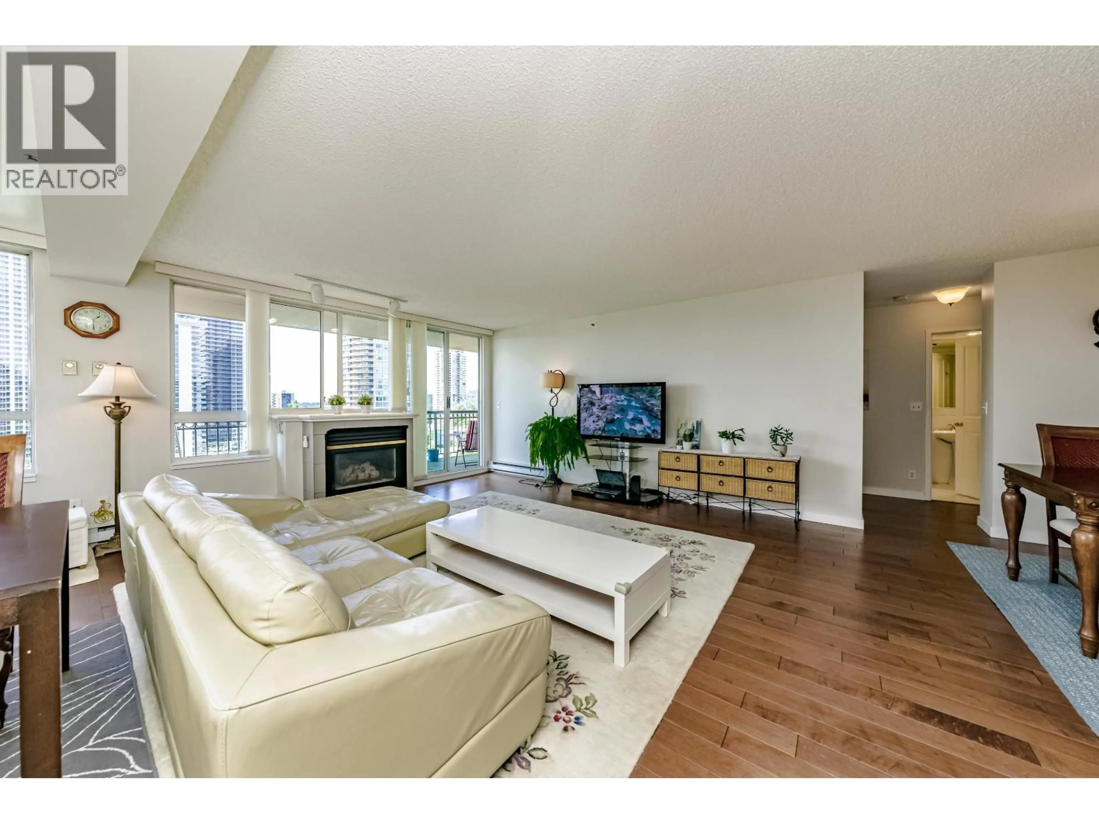 Living room with furniture, wood/laminate floor for 1503 - 545 AUSTIN AVENUE, Coquitlam British Columbia V3K6R4