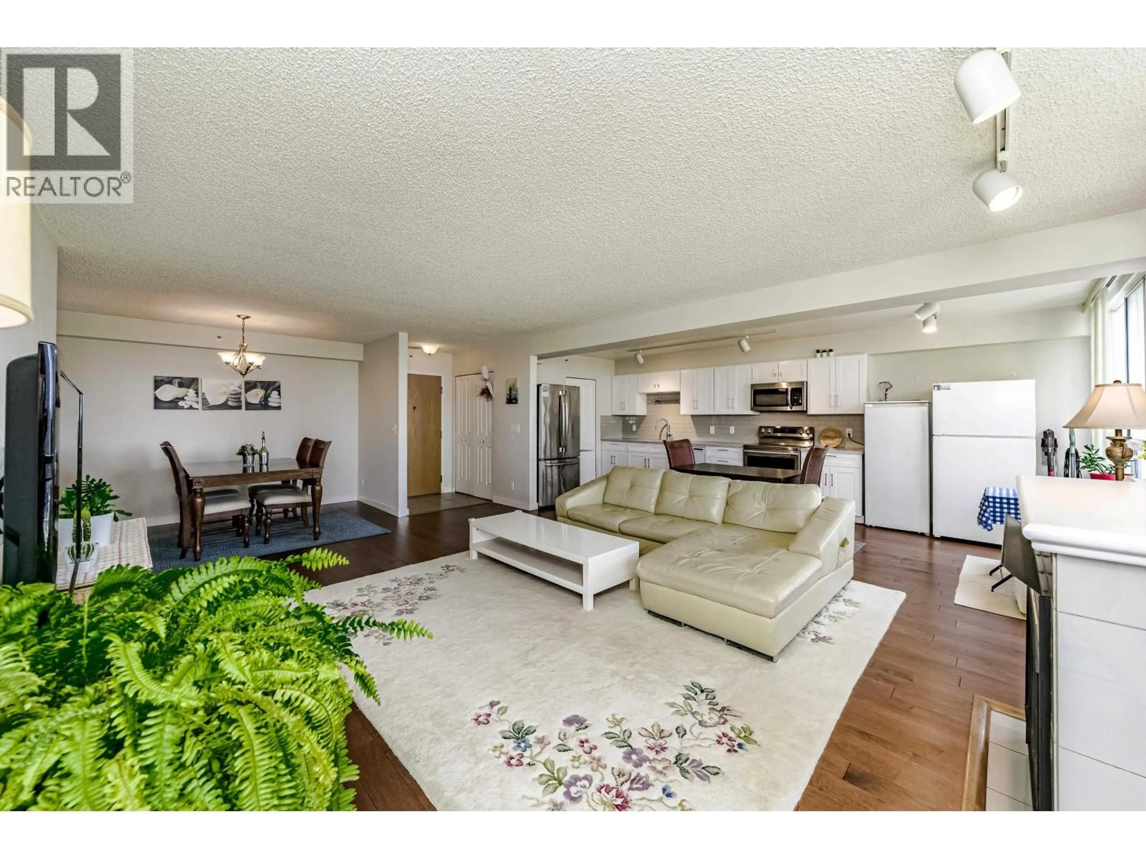 Living room with furniture, wood/laminate floor for 1503 - 545 AUSTIN AVENUE, Coquitlam British Columbia V3K6R4