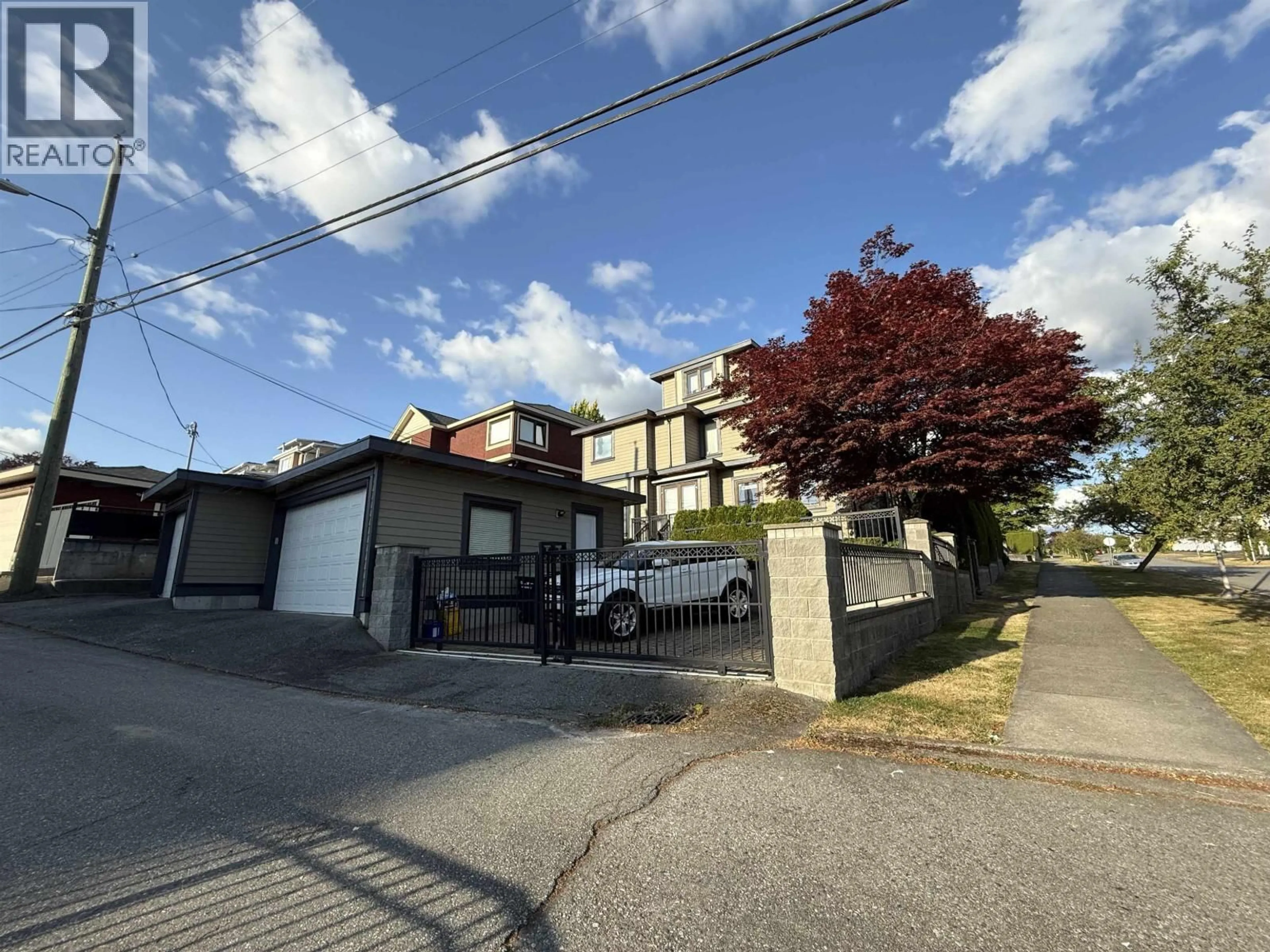 A pic from outside/outdoor area/front of a property/back of a property/a pic from drone, street for 7689 JASPER CRESCENT, Vancouver British Columbia V5P3S7