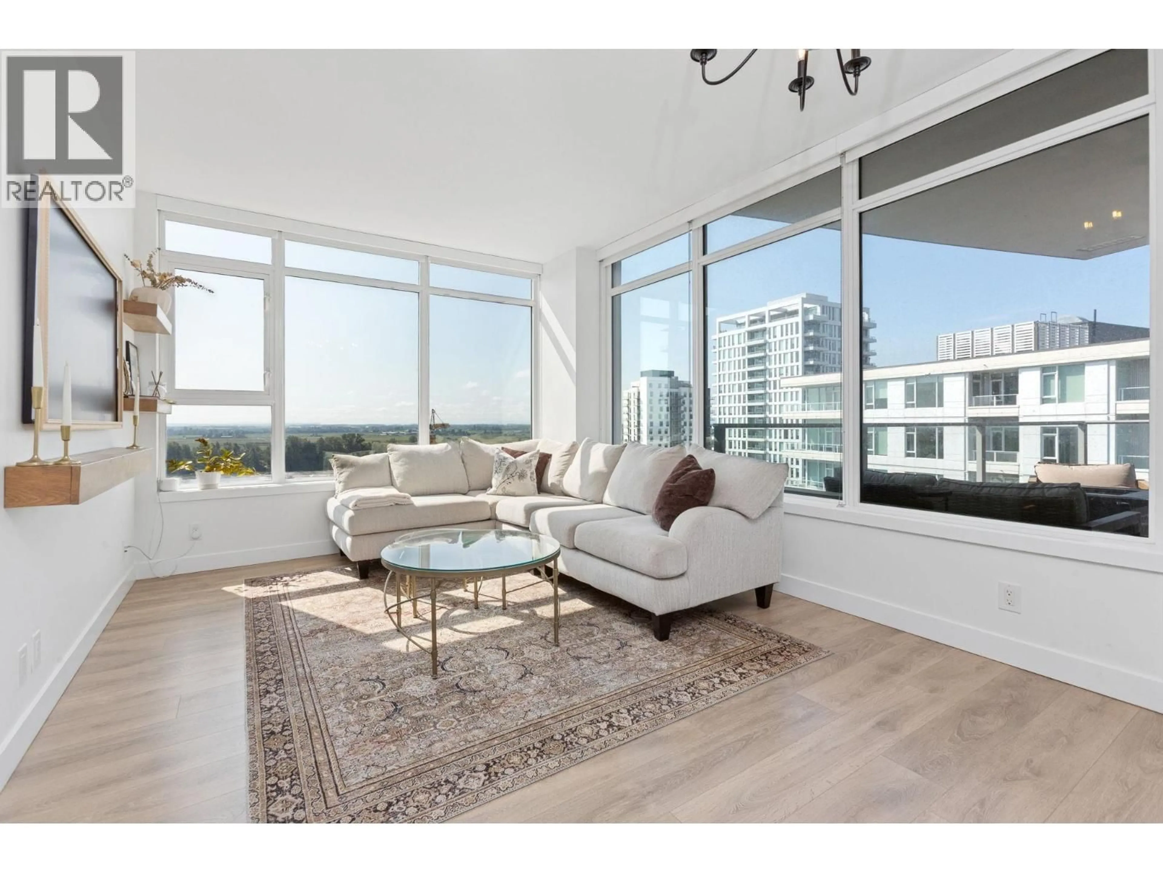 Living room with furniture, unknown for 2107 - 8538 RIVER DISTRICT CROSSING, Vancouver British Columbia V5S0C9