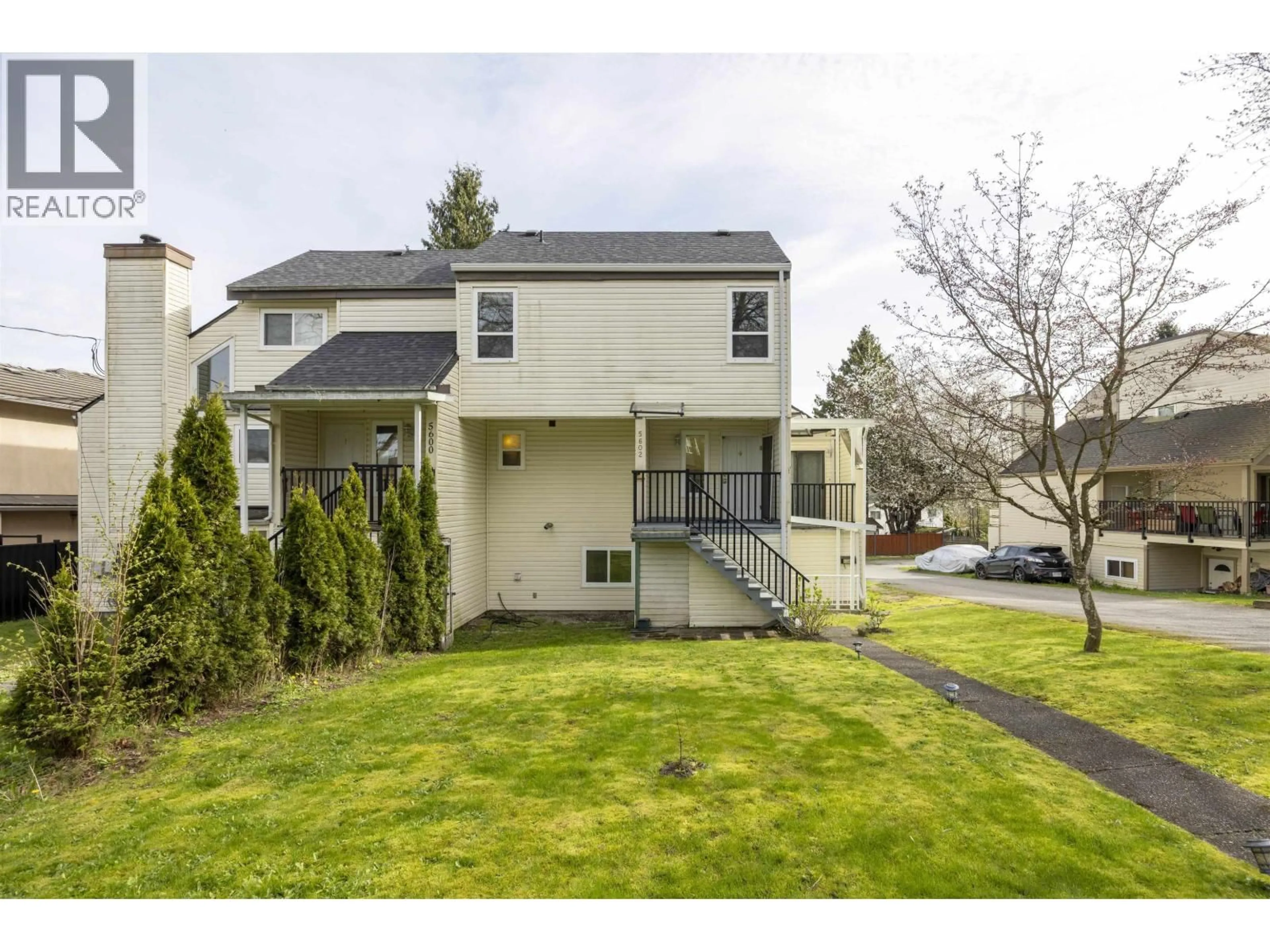 Home with vinyl exterior material, street for 5602 CLAUDE AVENUE, Burnaby British Columbia V5E2M6