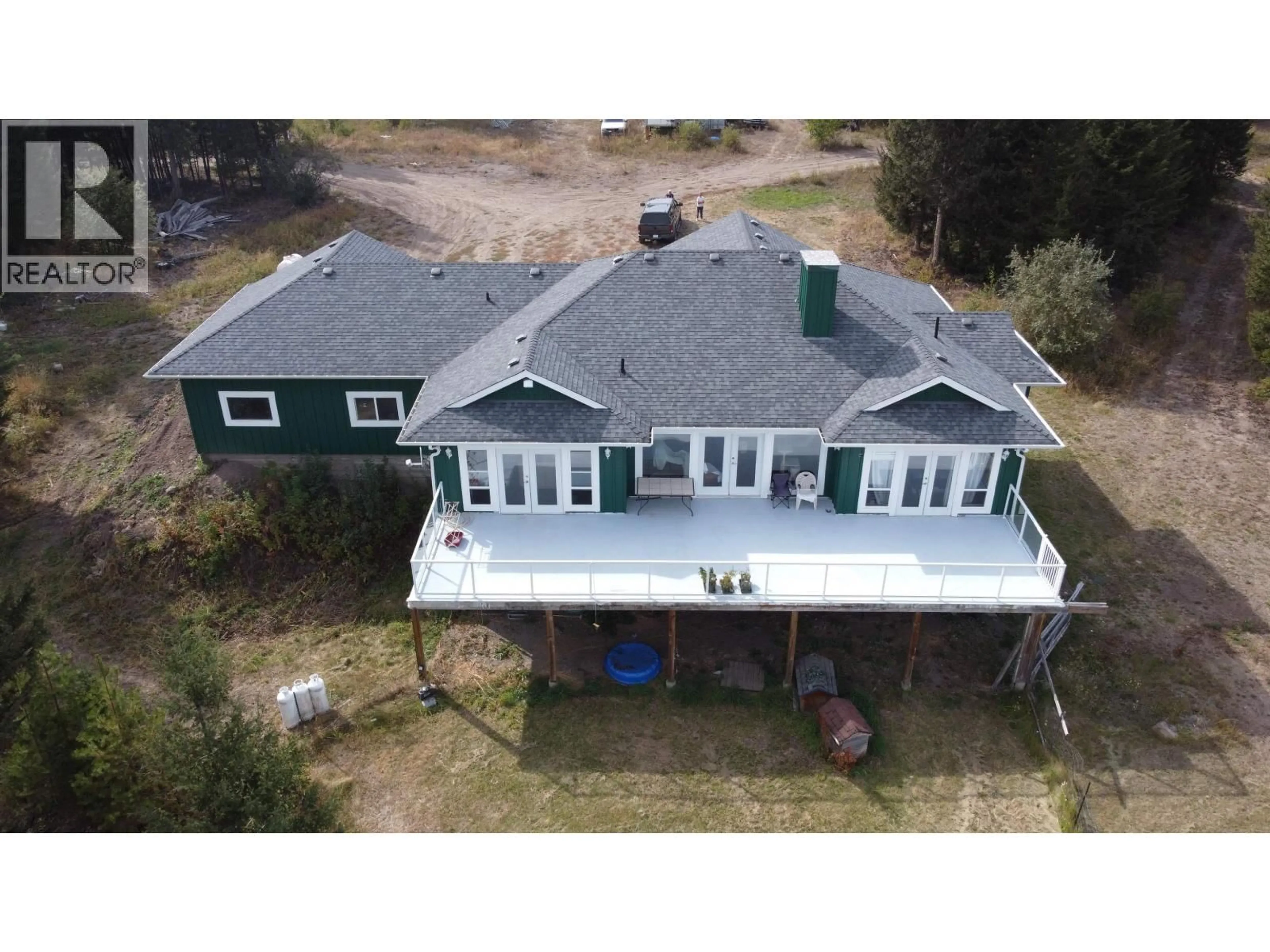 A pic from outside/outdoor area/front of a property/back of a property/a pic from drone, building for 5879 HILLTOP ROAD, Forest Grove British Columbia V0K2E0