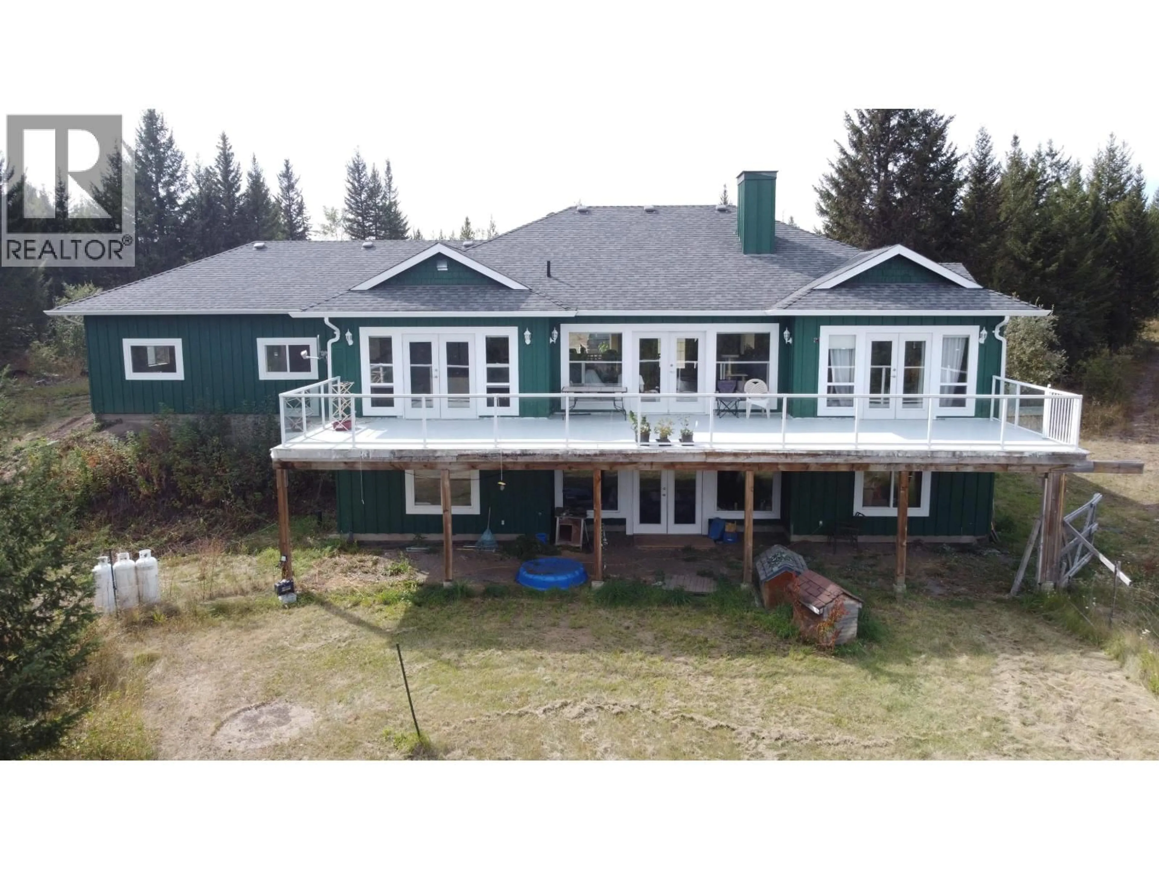 A pic from outside/outdoor area/front of a property/back of a property/a pic from drone, building for 5879 HILLTOP ROAD, Forest Grove British Columbia V0K2E0