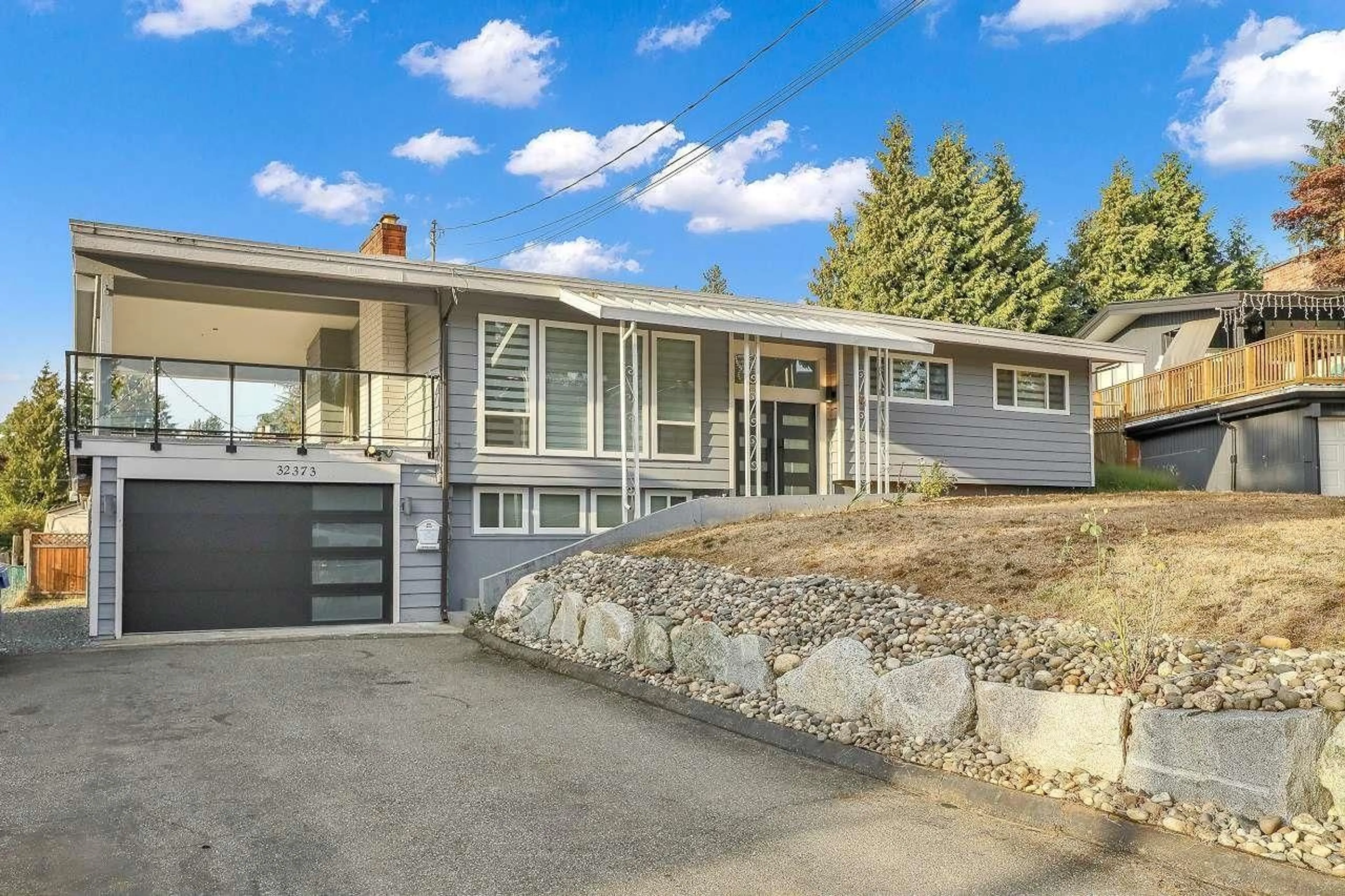 Home with vinyl exterior material, street for 32373 GROUSE, Abbotsford British Columbia V2T1K3