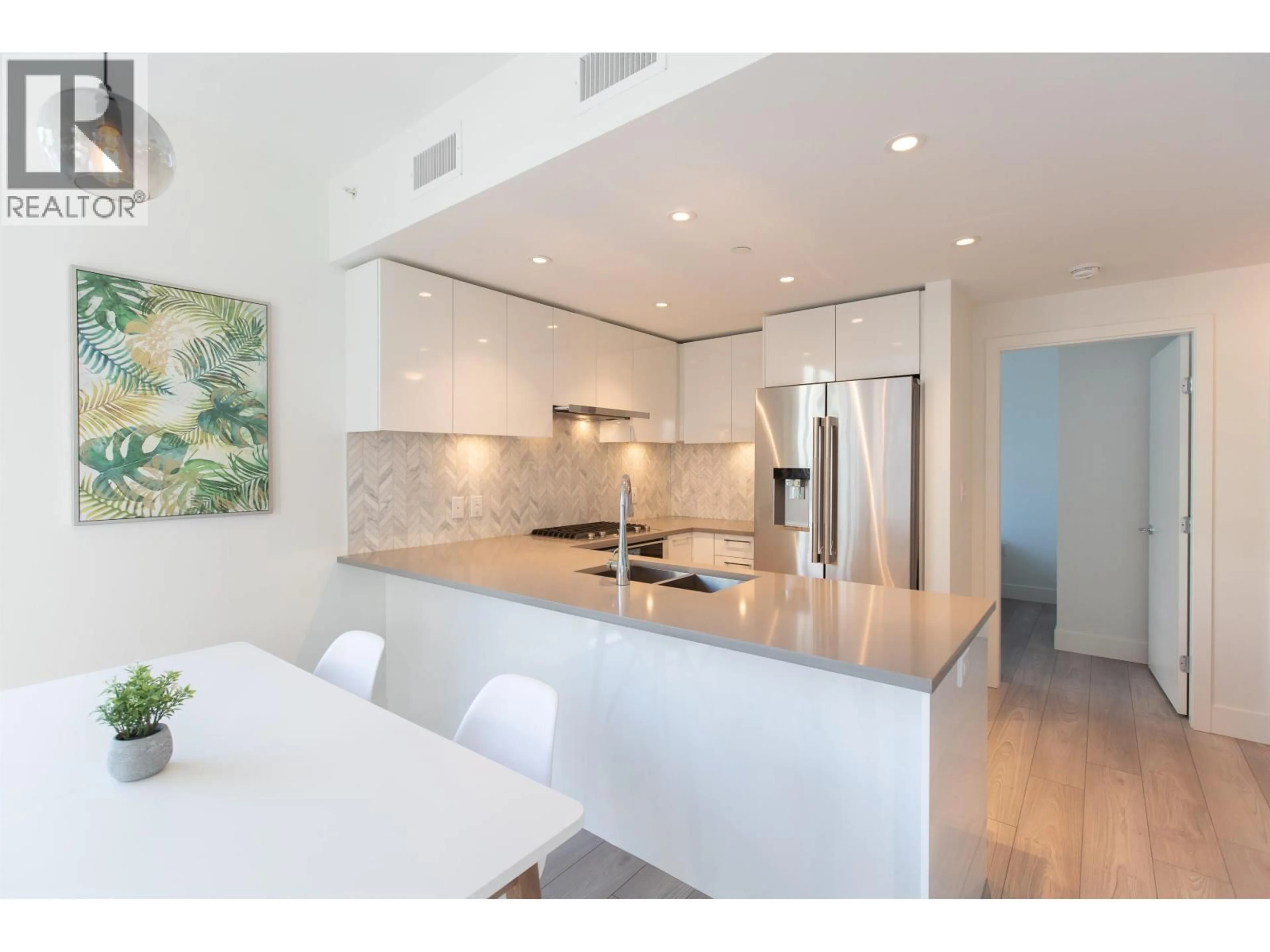 Open concept kitchen, ceramic/tile floor for 206 - 8570 RIVERGRASS DRIVE, Vancouver British Columbia V5S0H4