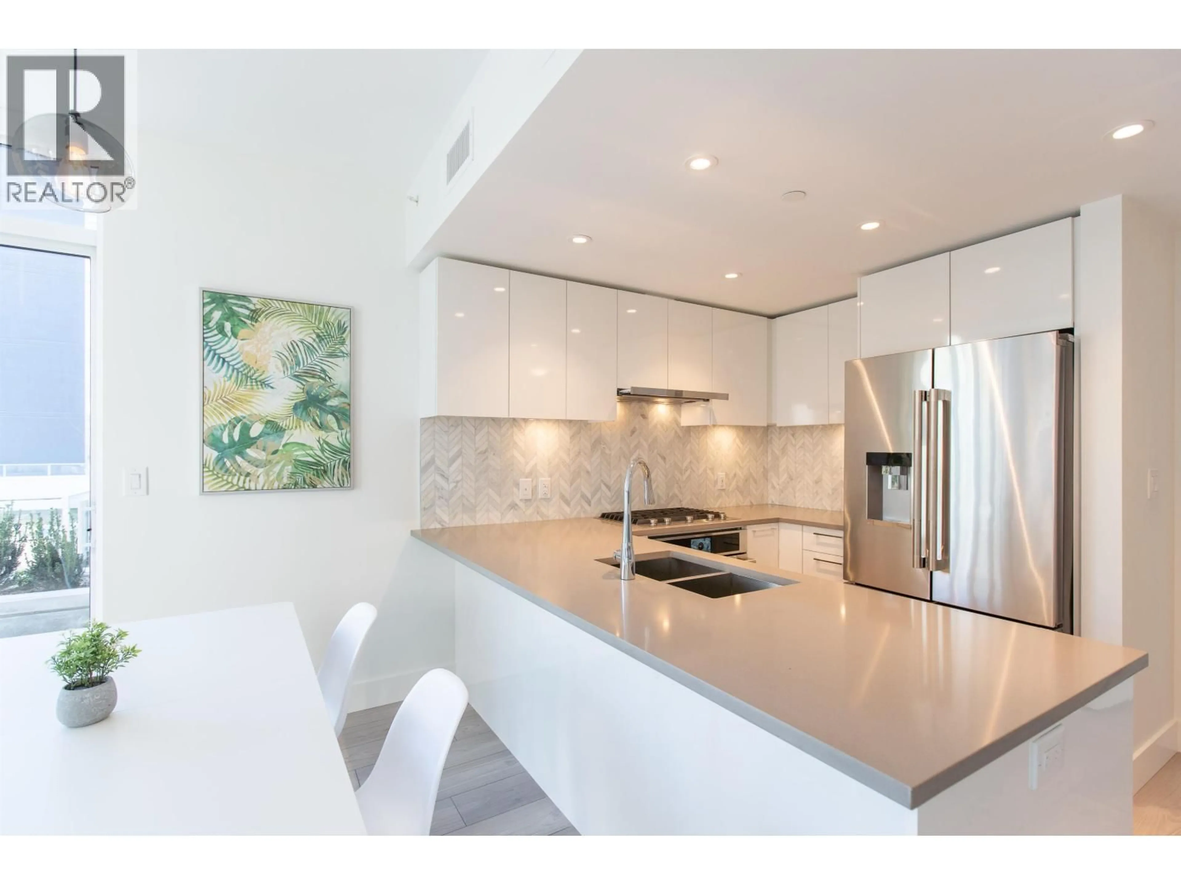 Open concept kitchen, ceramic/tile floor for 206 - 8570 RIVERGRASS DRIVE, Vancouver British Columbia V5S0H4