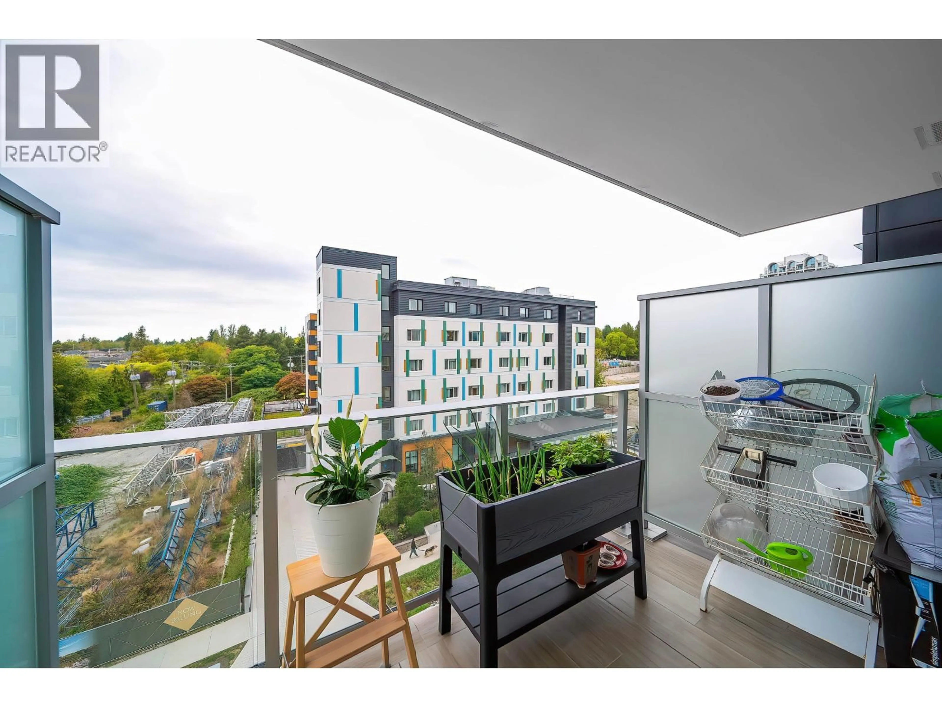 Balcony in the apartment, city buildings view from balcony for 708 - 7418 PAULSON STREET, Vancouver British Columbia V6P0K2