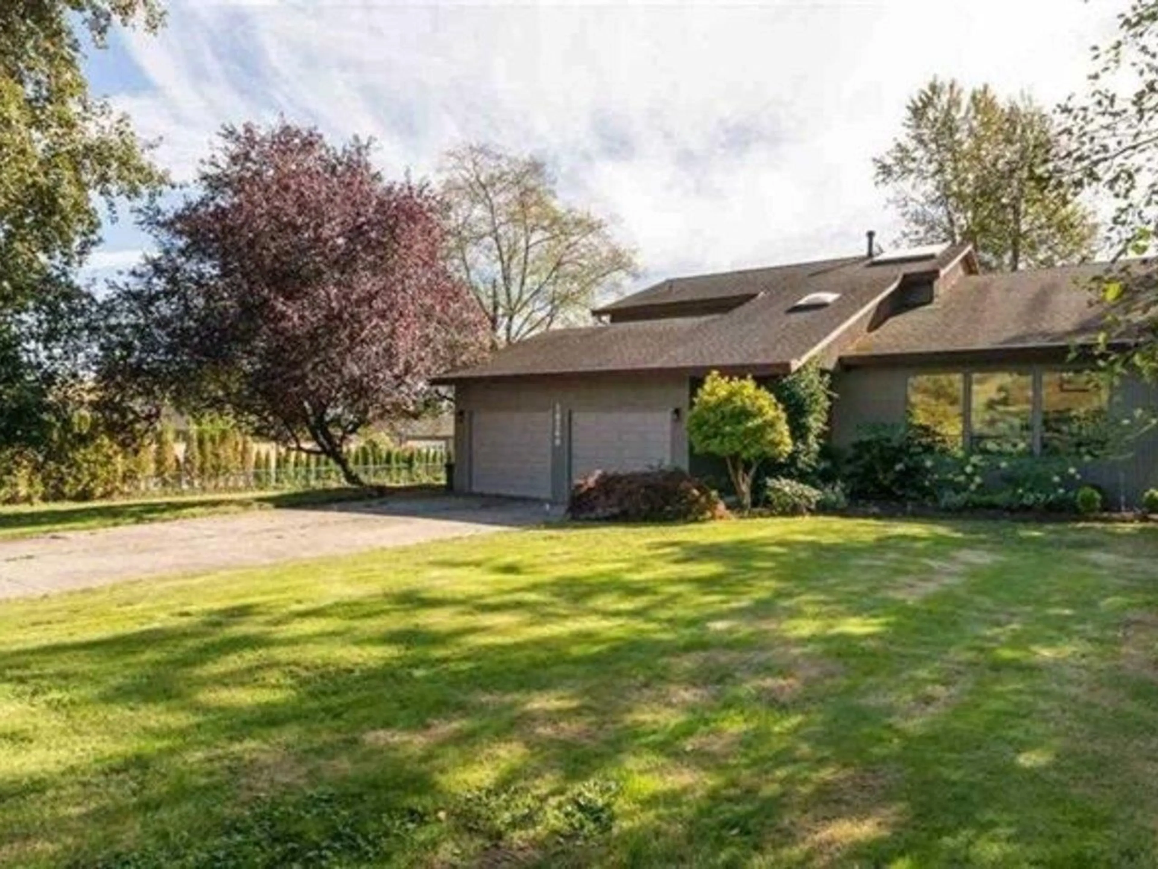 A pic from outside/outdoor area/front of a property/back of a property/a pic from drone, unknown for 18208 21A, Surrey British Columbia V3Z9W2