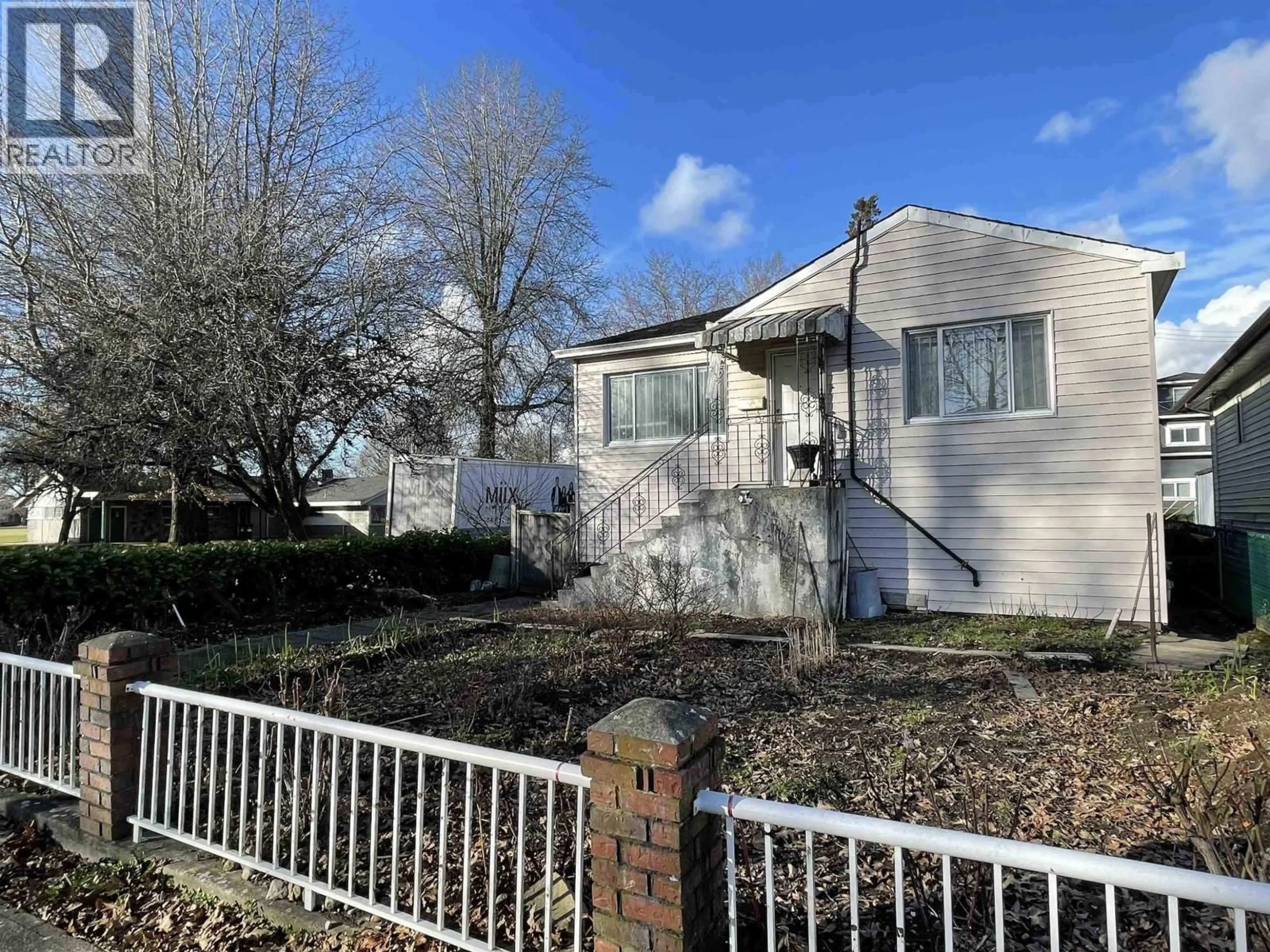 A pic from outside/outdoor area/front of a property/back of a property/a pic from drone, street for 1805 51ST AVENUE, Vancouver British Columbia V5P1W1