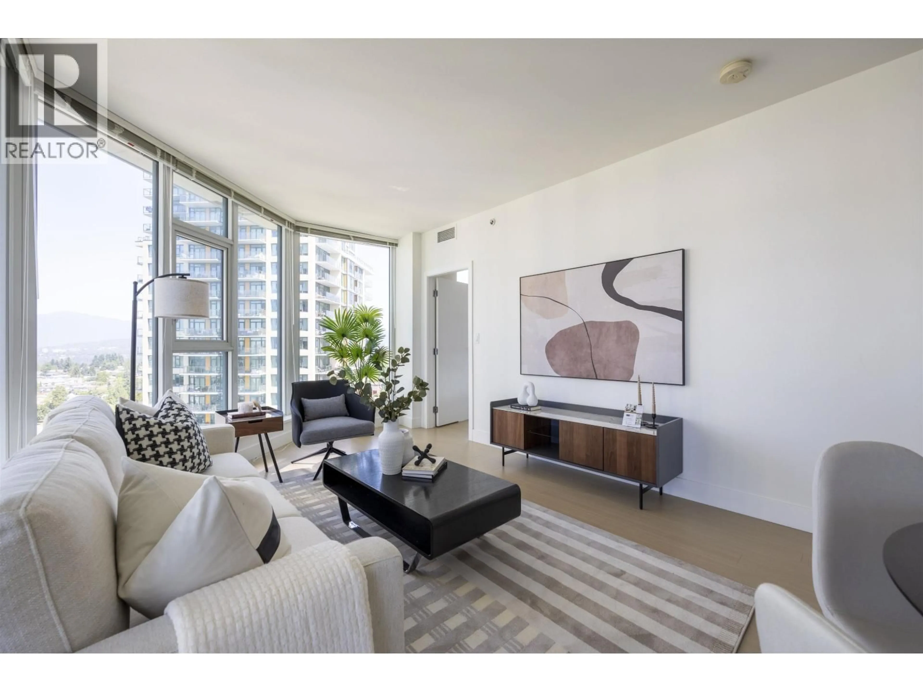 Living room with furniture, unknown for 1802 - 7388 KINGSWAY, Burnaby British Columbia V3N0G9
