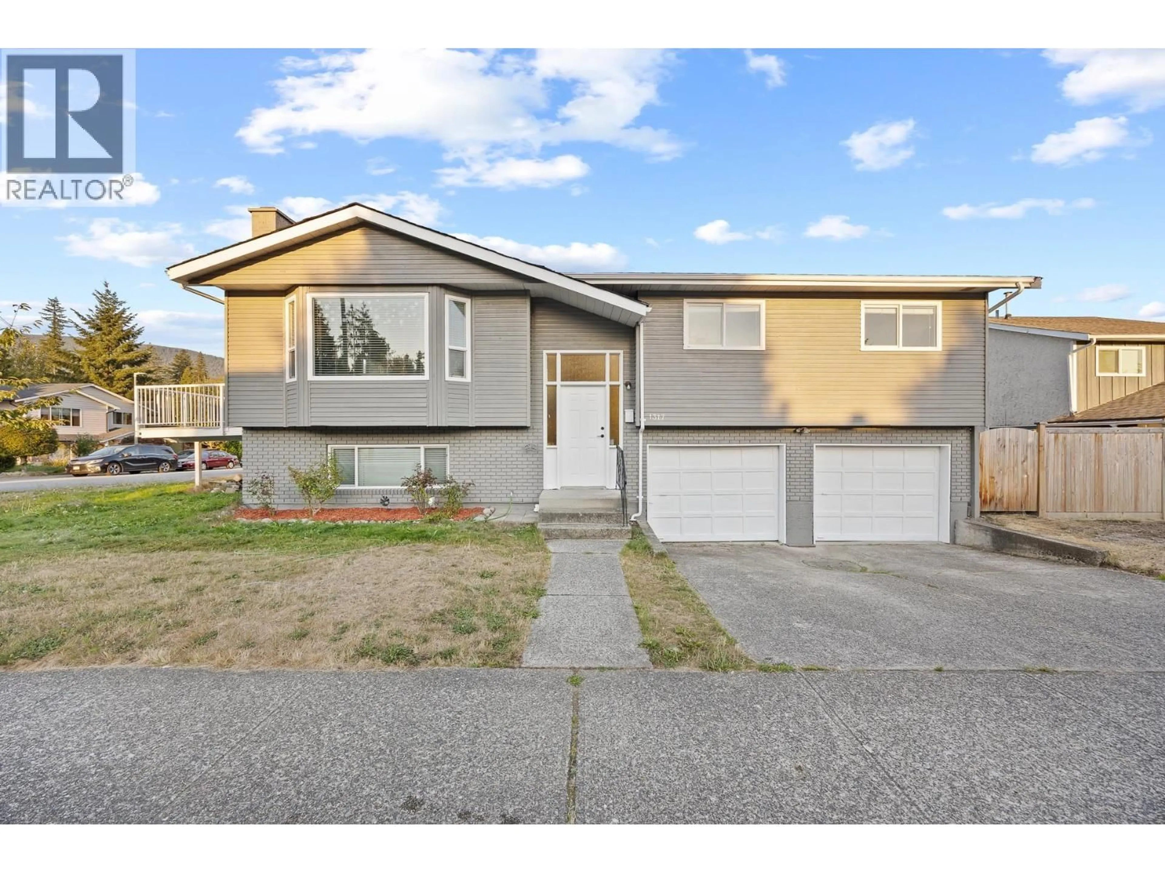 Home with vinyl exterior material, street for 1317 HORNBY STREET, Coquitlam British Columbia V3E1V3