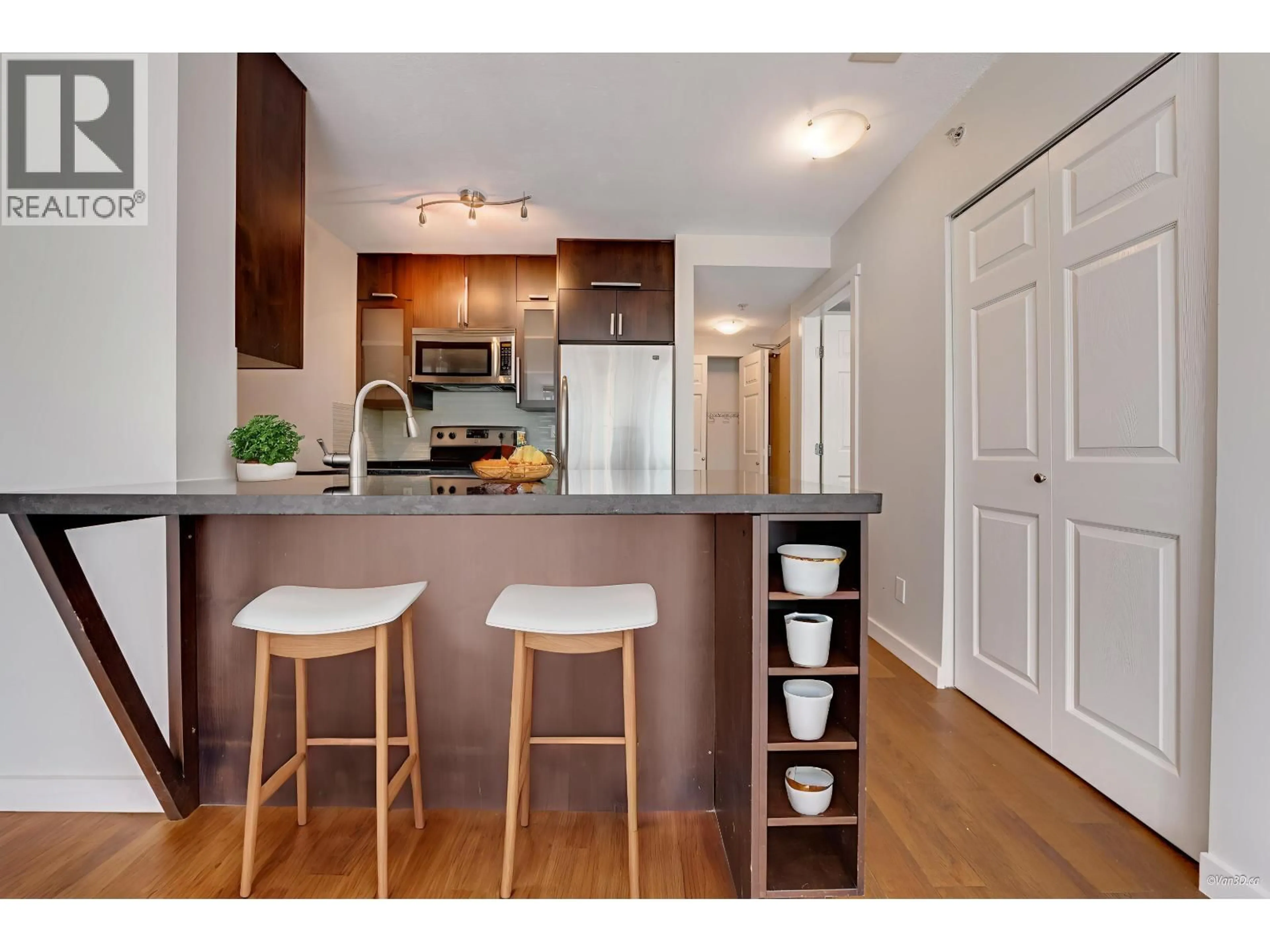 Open concept kitchen, wood/laminate floor for 701 - 1420 GEORGIA STREET, Vancouver British Columbia V6G3K4