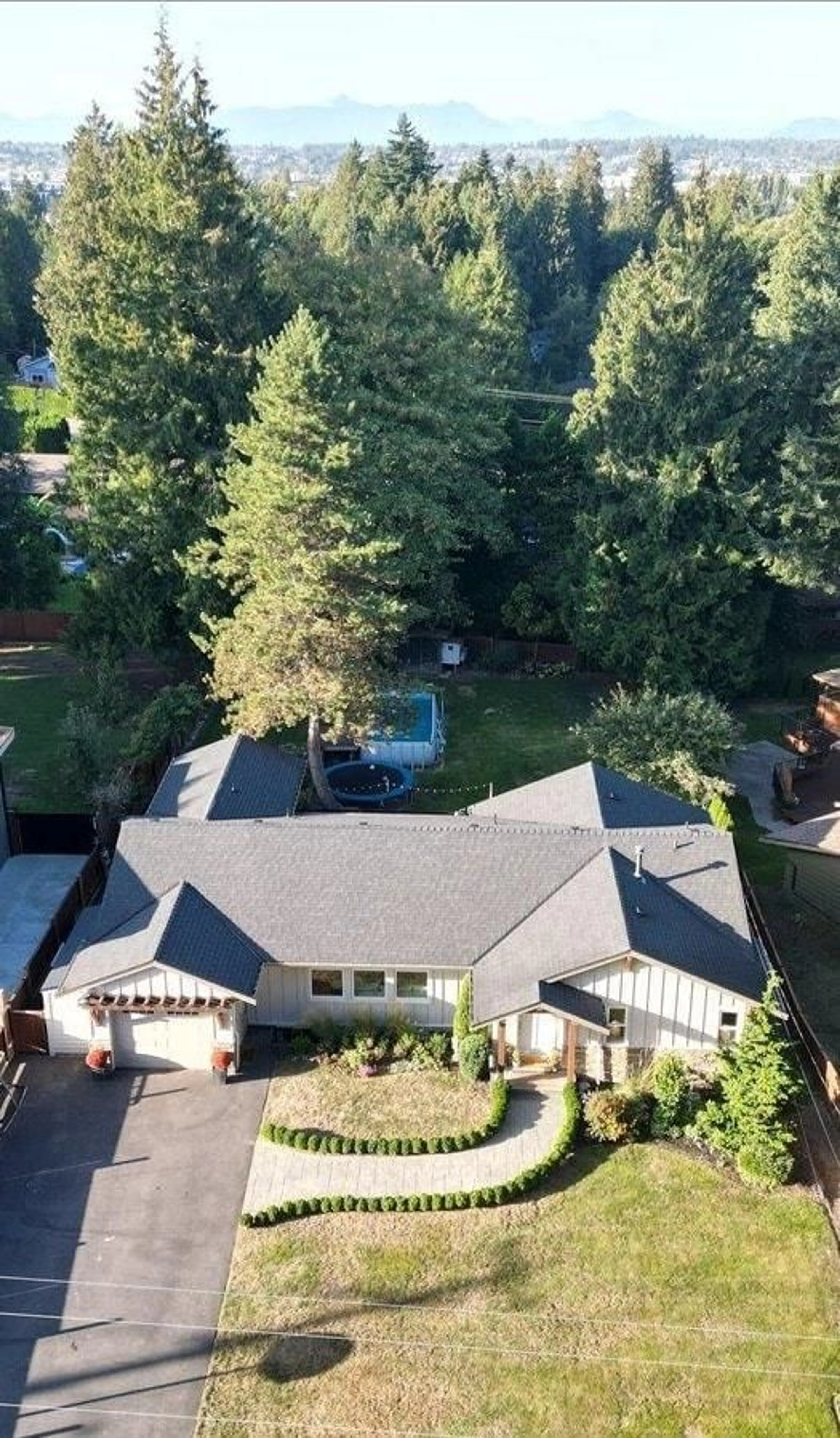 A pic from outside/outdoor area/front of a property/back of a property/a pic from drone, unknown for 20181 48, Langley British Columbia V3A3L3