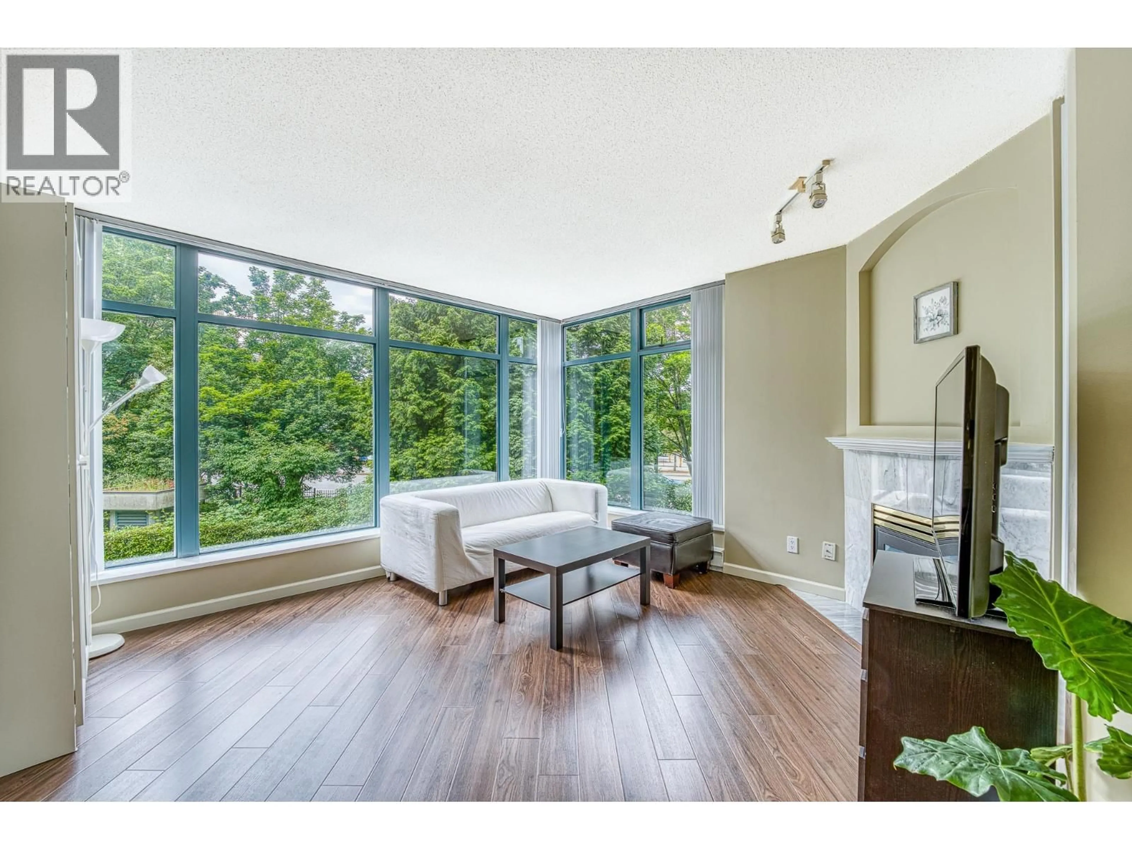 Living room with furniture, unknown for 206 - 4505 HAZEL STREET, Burnaby British Columbia V5H4T1