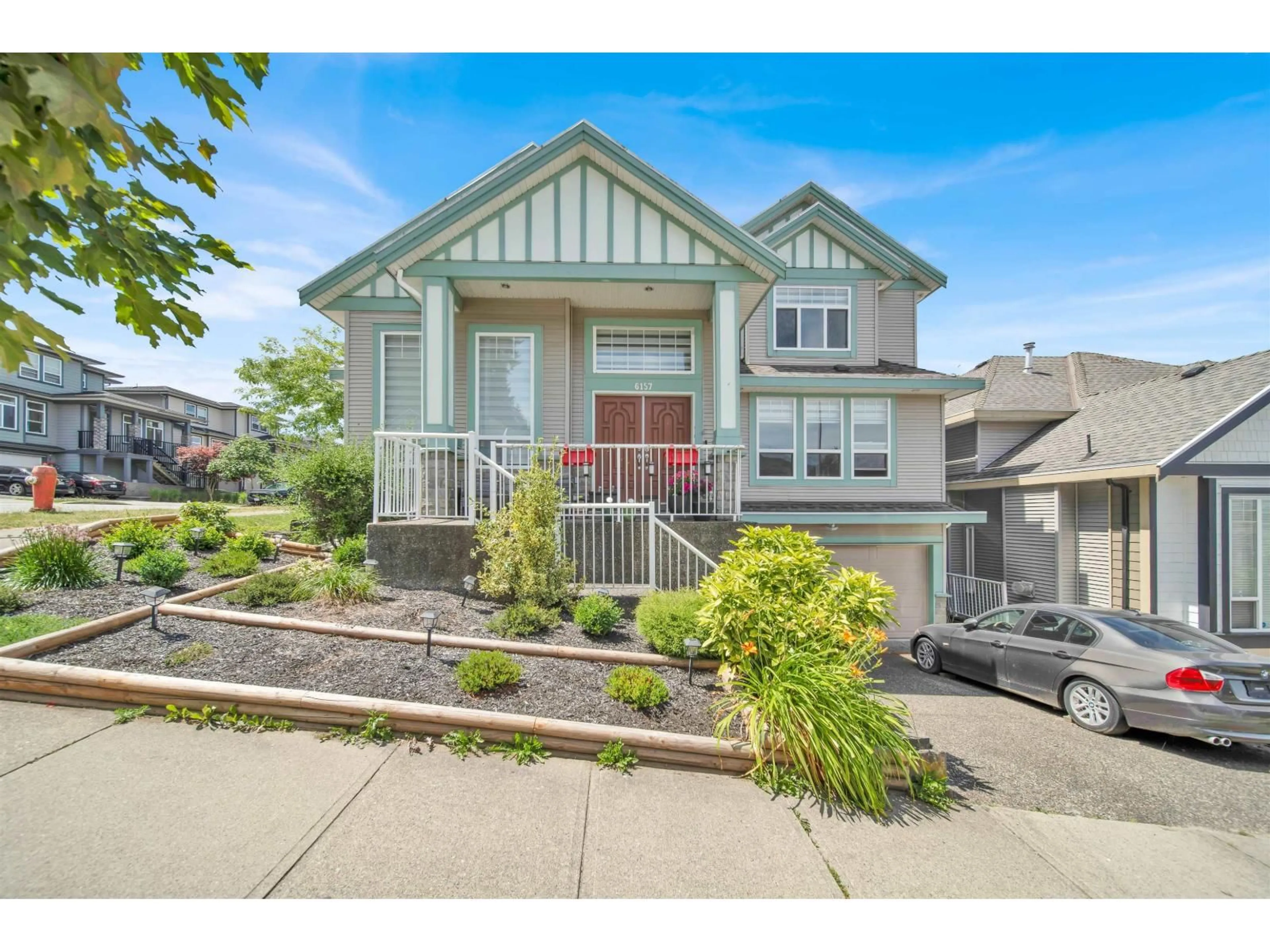 Home with vinyl exterior material, street for 6157 146, Surrey British Columbia V3T3A1