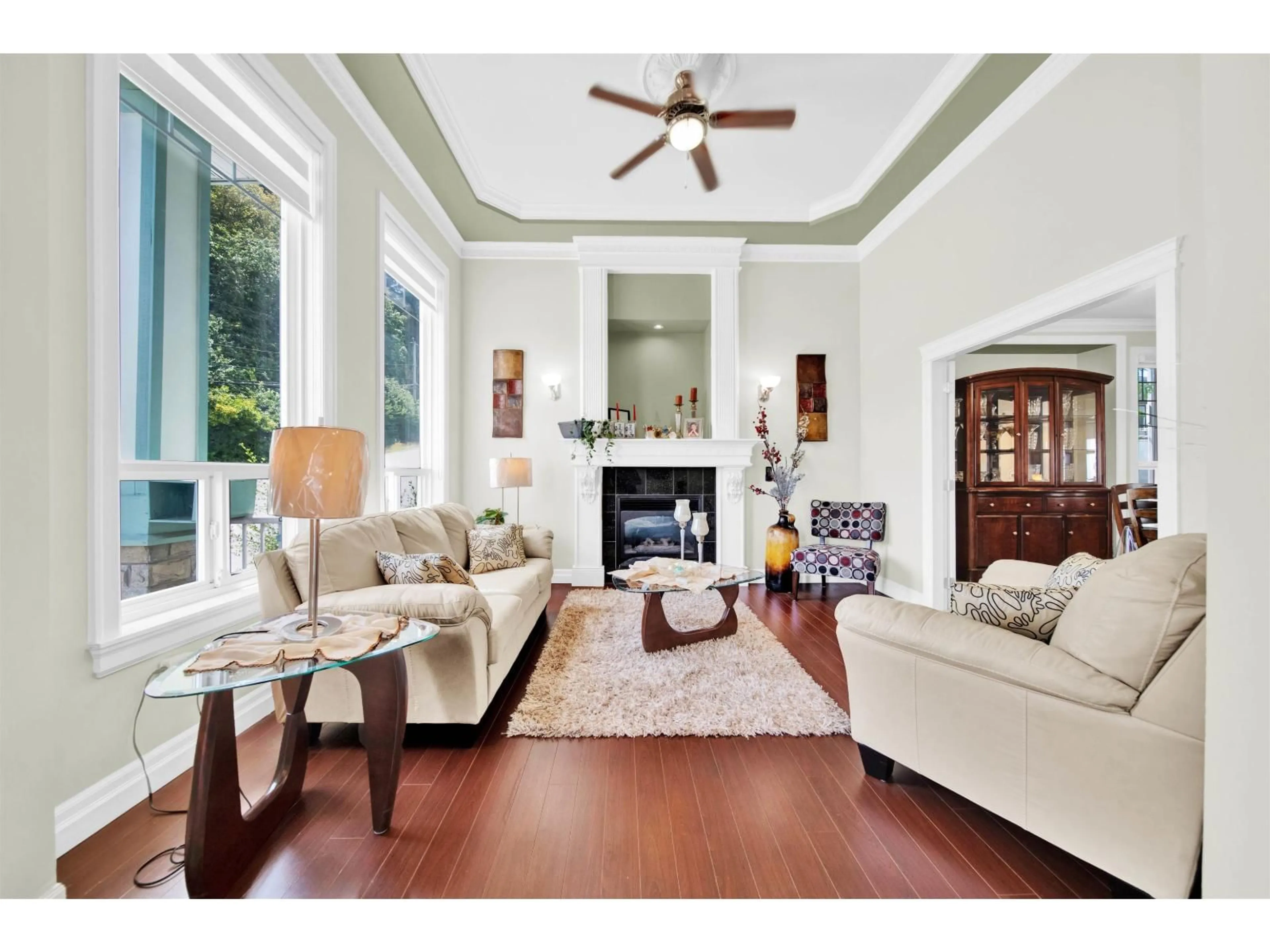 Living room with furniture, wood/laminate floor for 6157 146, Surrey British Columbia V3T3A1