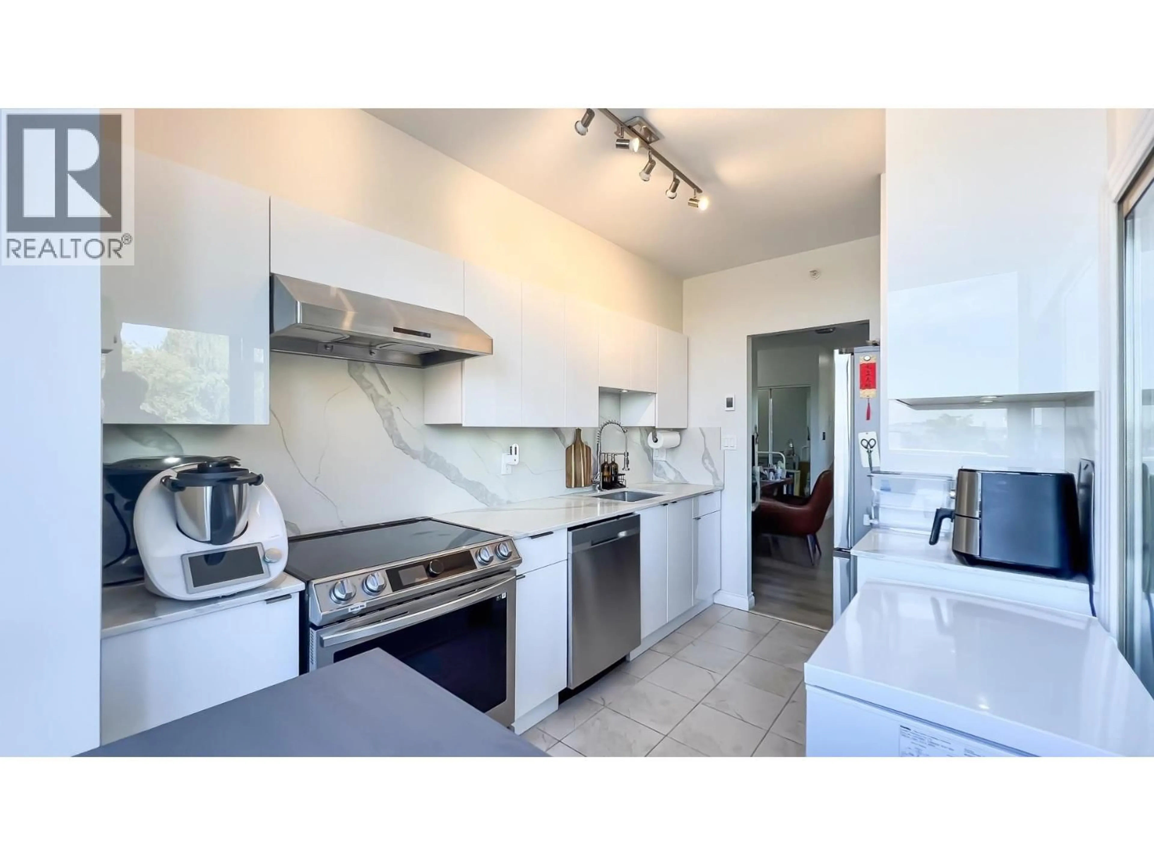 Standard kitchen, ceramic/tile floor for 202 - 2580 TOLMIE STREET, Vancouver British Columbia V6R4R4