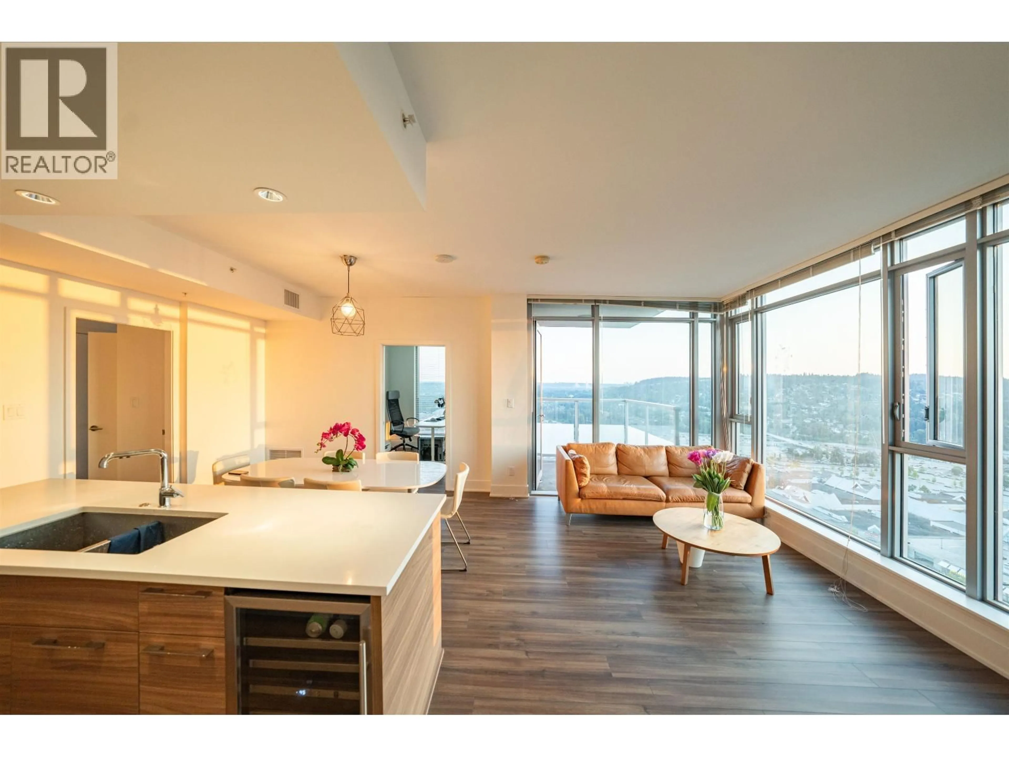 Open concept kitchen, wood/laminate floor for 4201 - 1188 PINETREE WAY, Coquitlam British Columbia V3B0K9