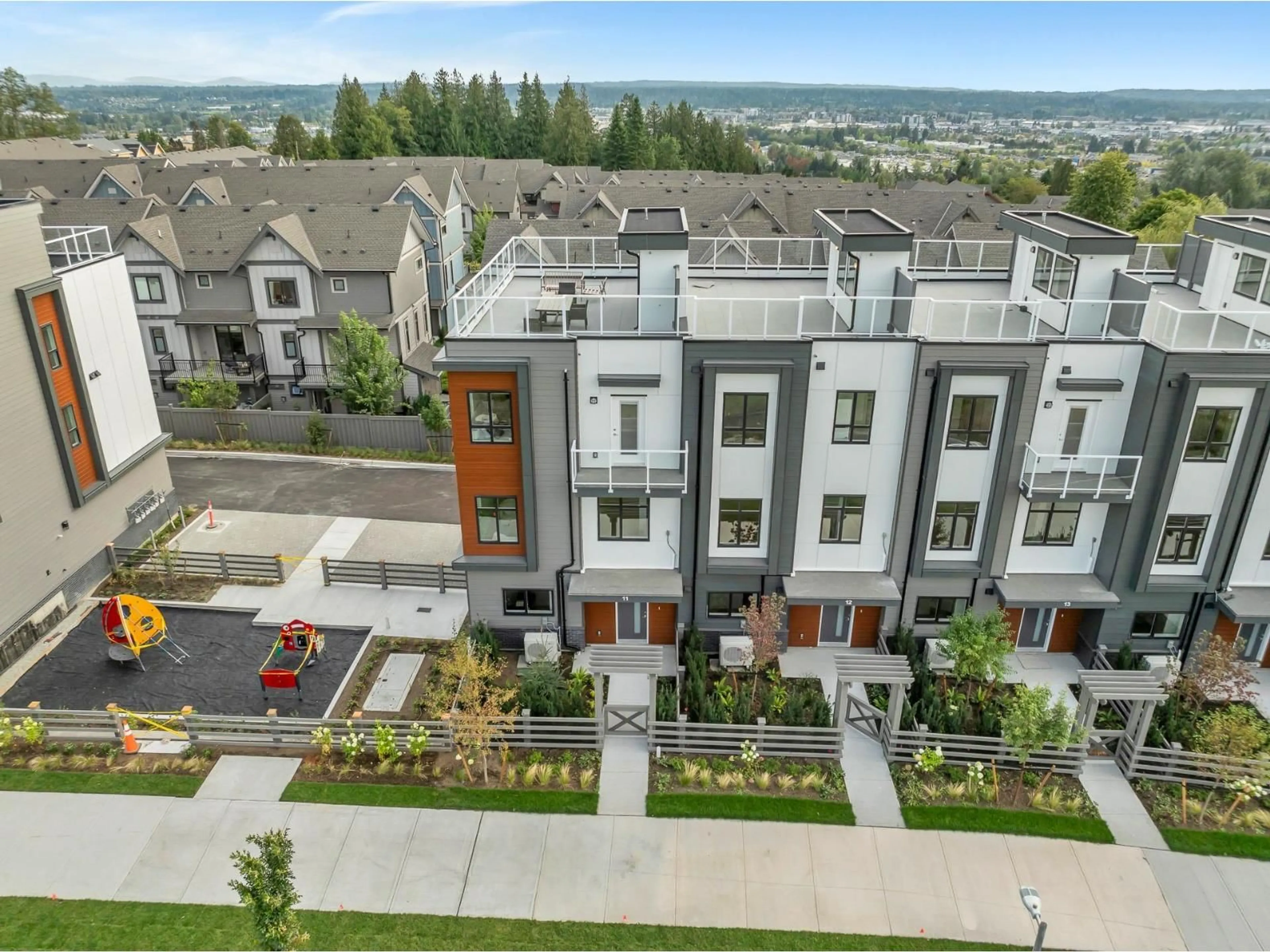 A pic from outside/outdoor area/front of a property/back of a property/a pic from drone, unknown for 11 - 6983 204, Langley British Columbia V2Y1P8