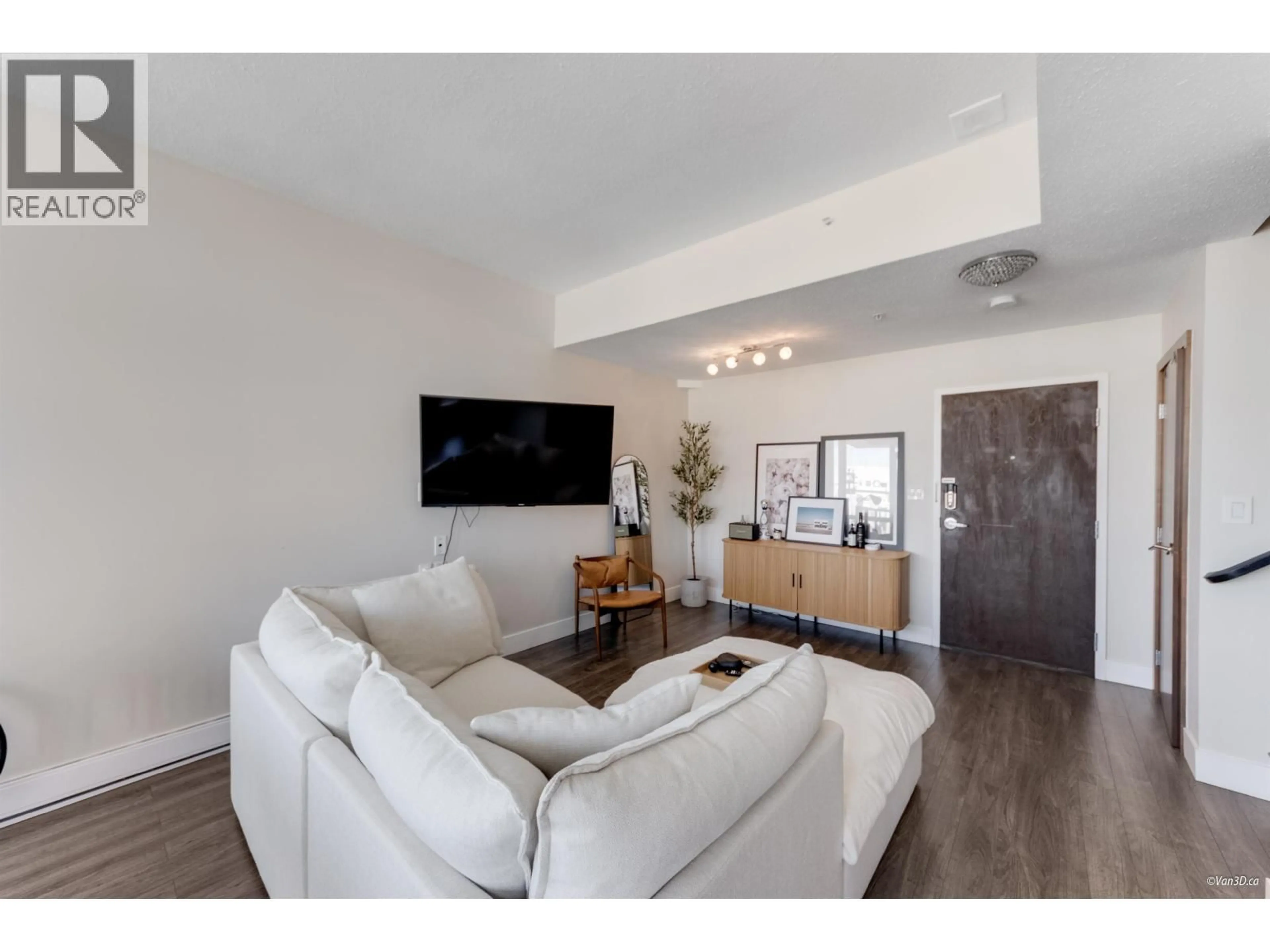 Living room with furniture, wood/laminate floor for 2204 - 1420 GEORGIA STREET, Vancouver British Columbia V6G3K4