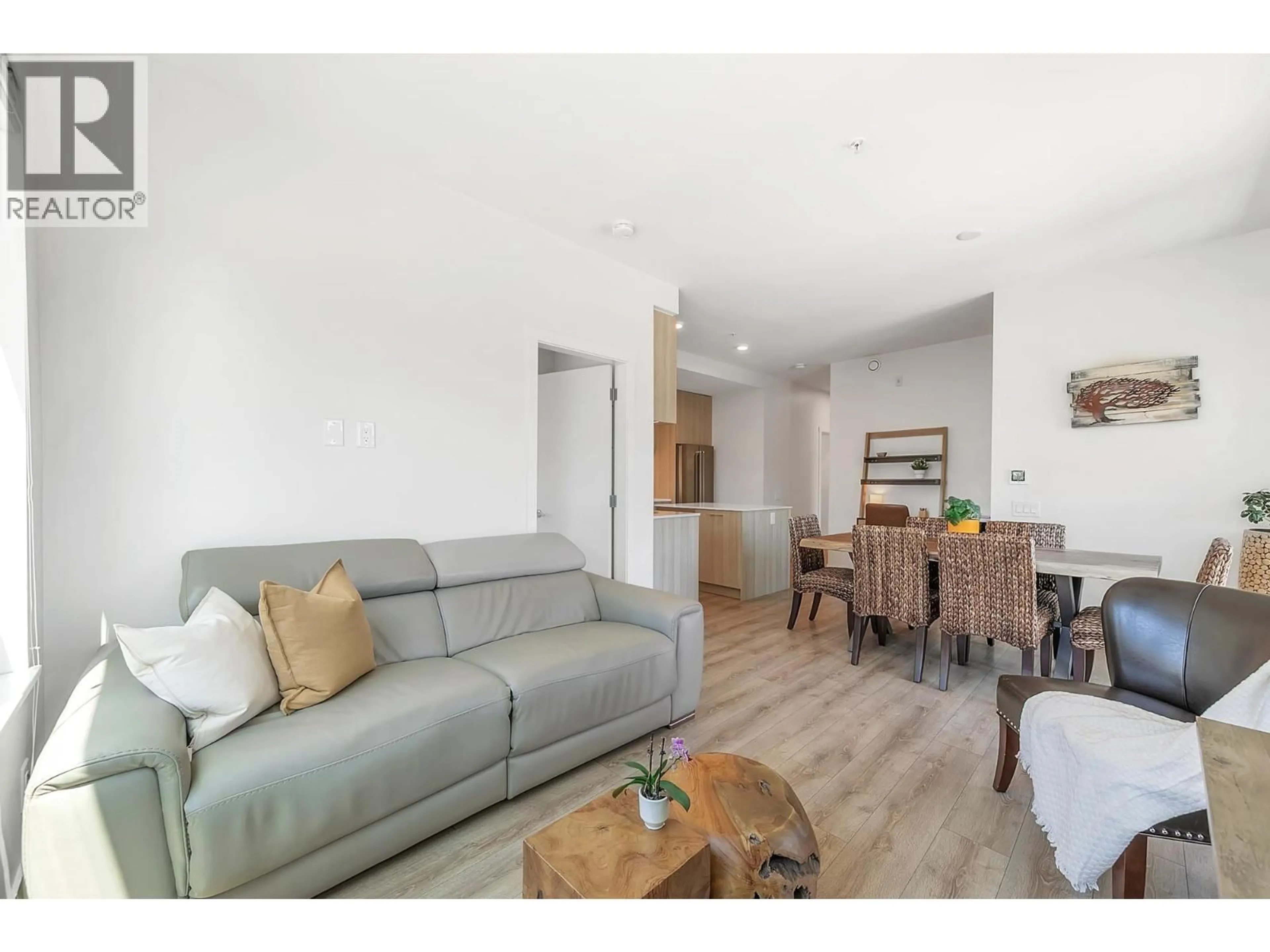 Living room with furniture, wood/laminate floor for 223 - 721 ANSKAR COURT, Coquitlam British Columbia V3J0L4