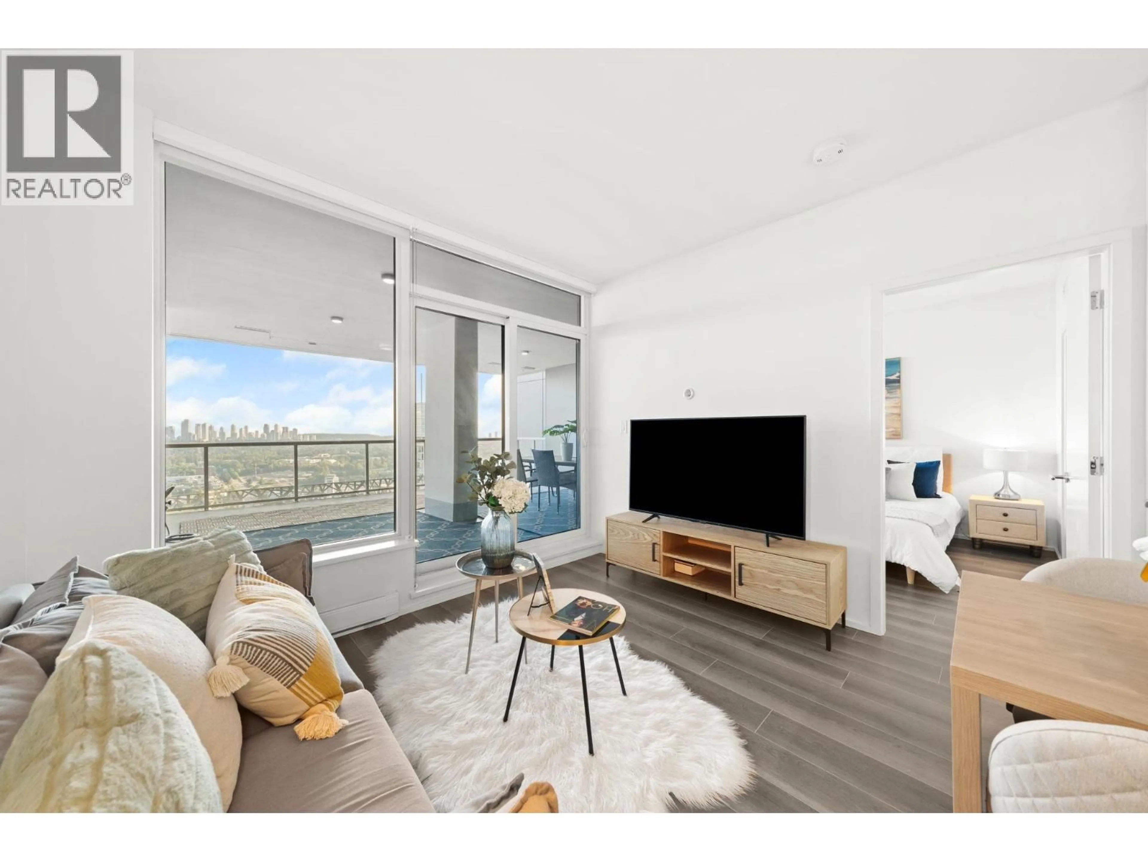 Living room with furniture, wood/laminate floor for 5606 - 4510 HALIFAX WAY, Burnaby British Columbia V5C0K4