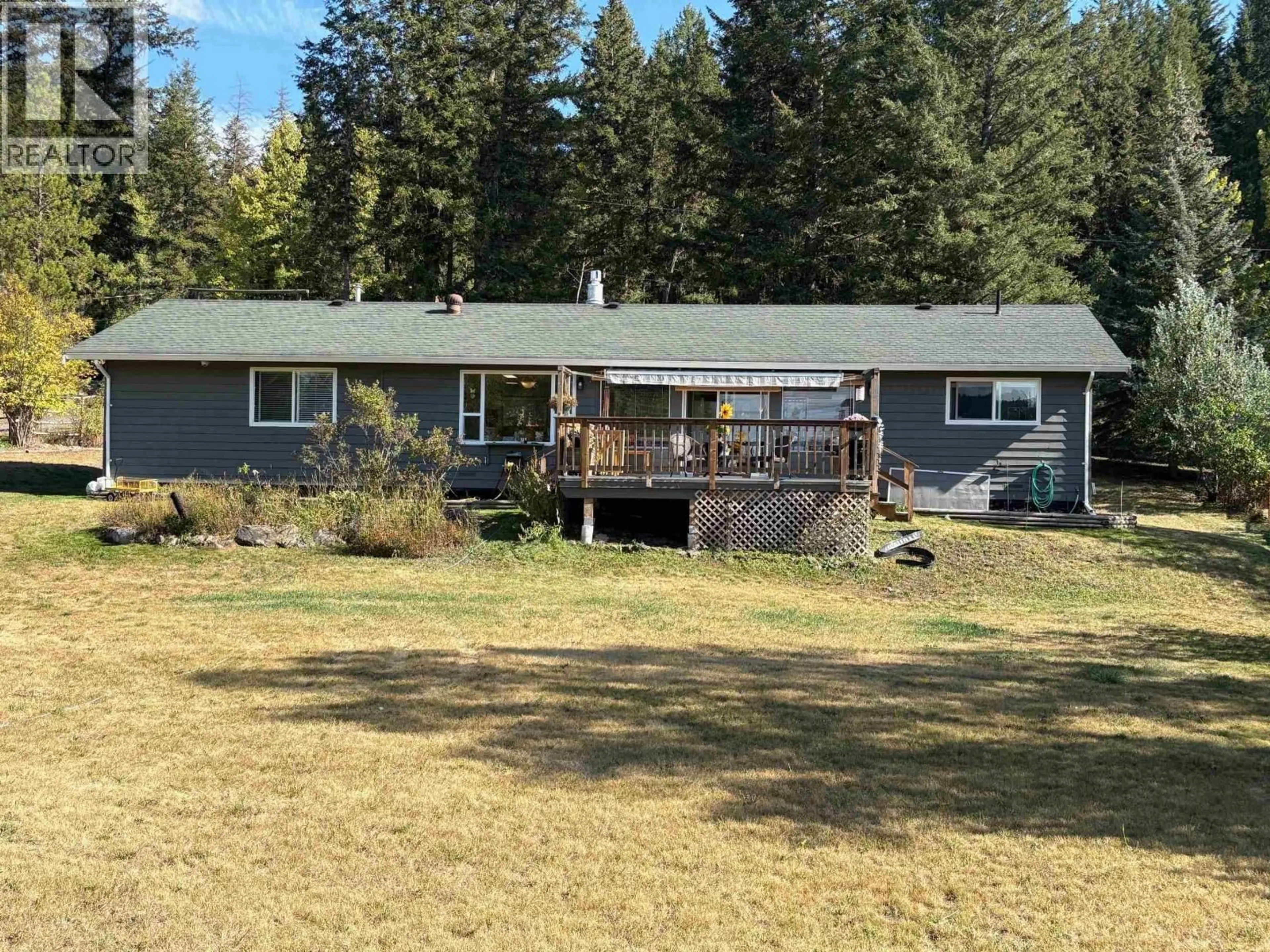 A pic from outside/outdoor area/front of a property/back of a property/a pic from drone, mountain view for 5199 KALLUM DRIVE, 108 Mile Ranch British Columbia V0K2Z0