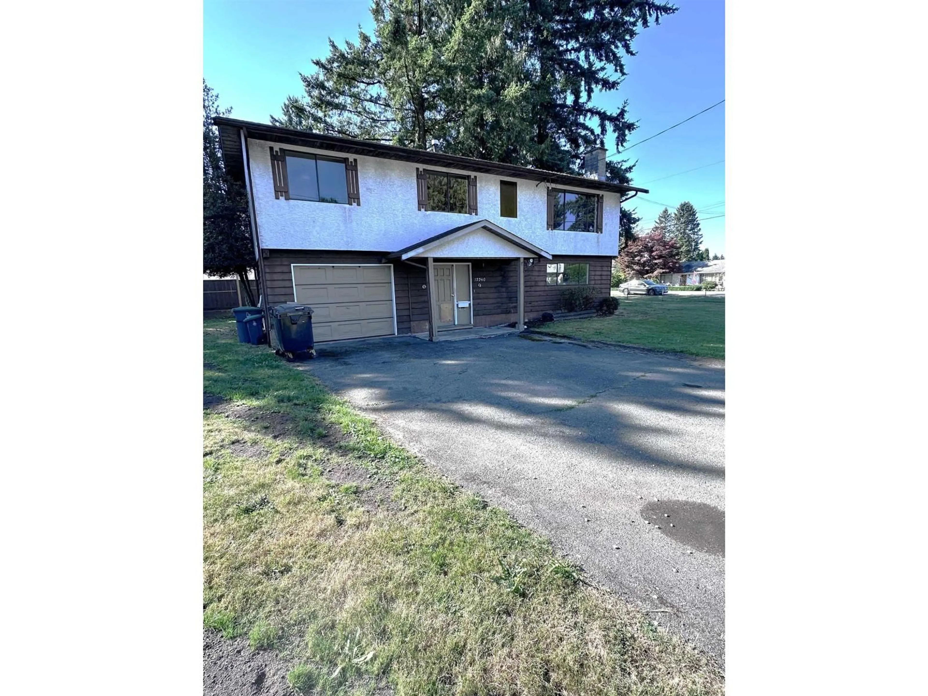 A pic from outside/outdoor area/front of a property/back of a property/a pic from drone, street for 12260 85, Surrey British Columbia V3W6G9