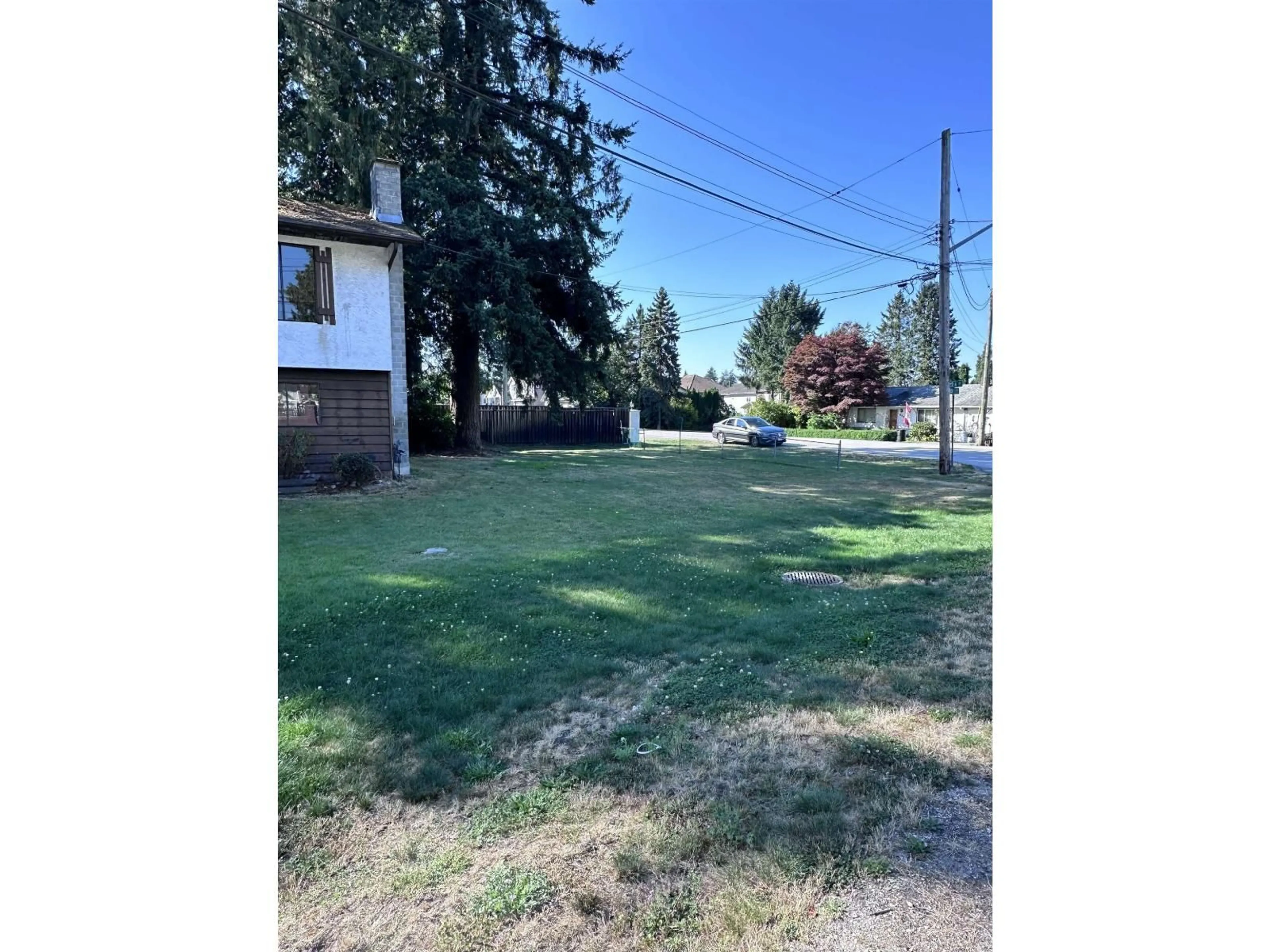 A pic from outside/outdoor area/front of a property/back of a property/a pic from drone, street for 12260 85, Surrey British Columbia V3W6G9