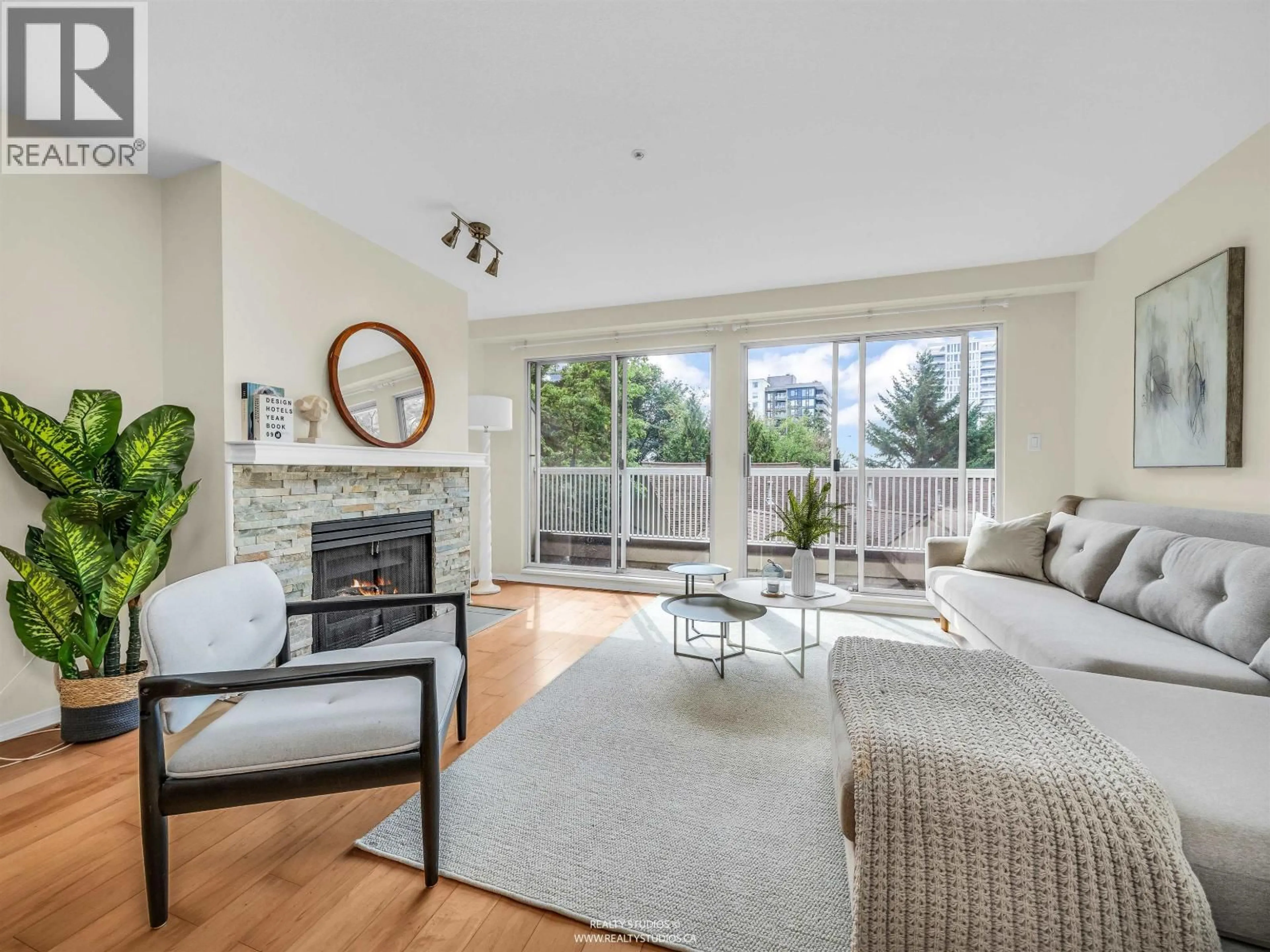 Living room with furniture, wood/laminate floor for 3461 AMBERLY PLACE, Vancouver British Columbia V5S4P9