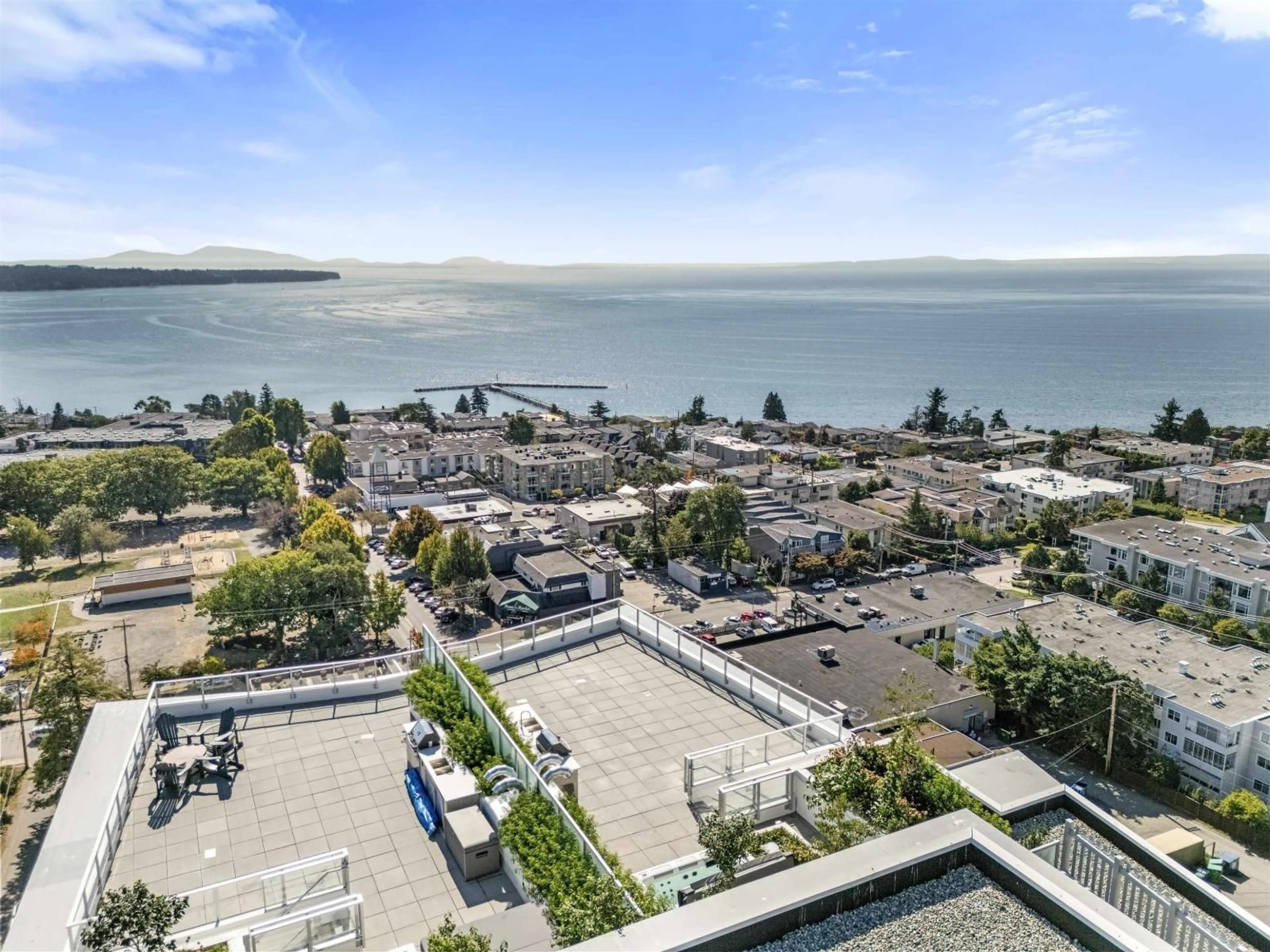 A pic from outside/outdoor area/front of a property/back of a property/a pic from drone, water/lake/river/ocean view for 1302 - 1342 JOHNSTON, White Rock British Columbia V4B0C7