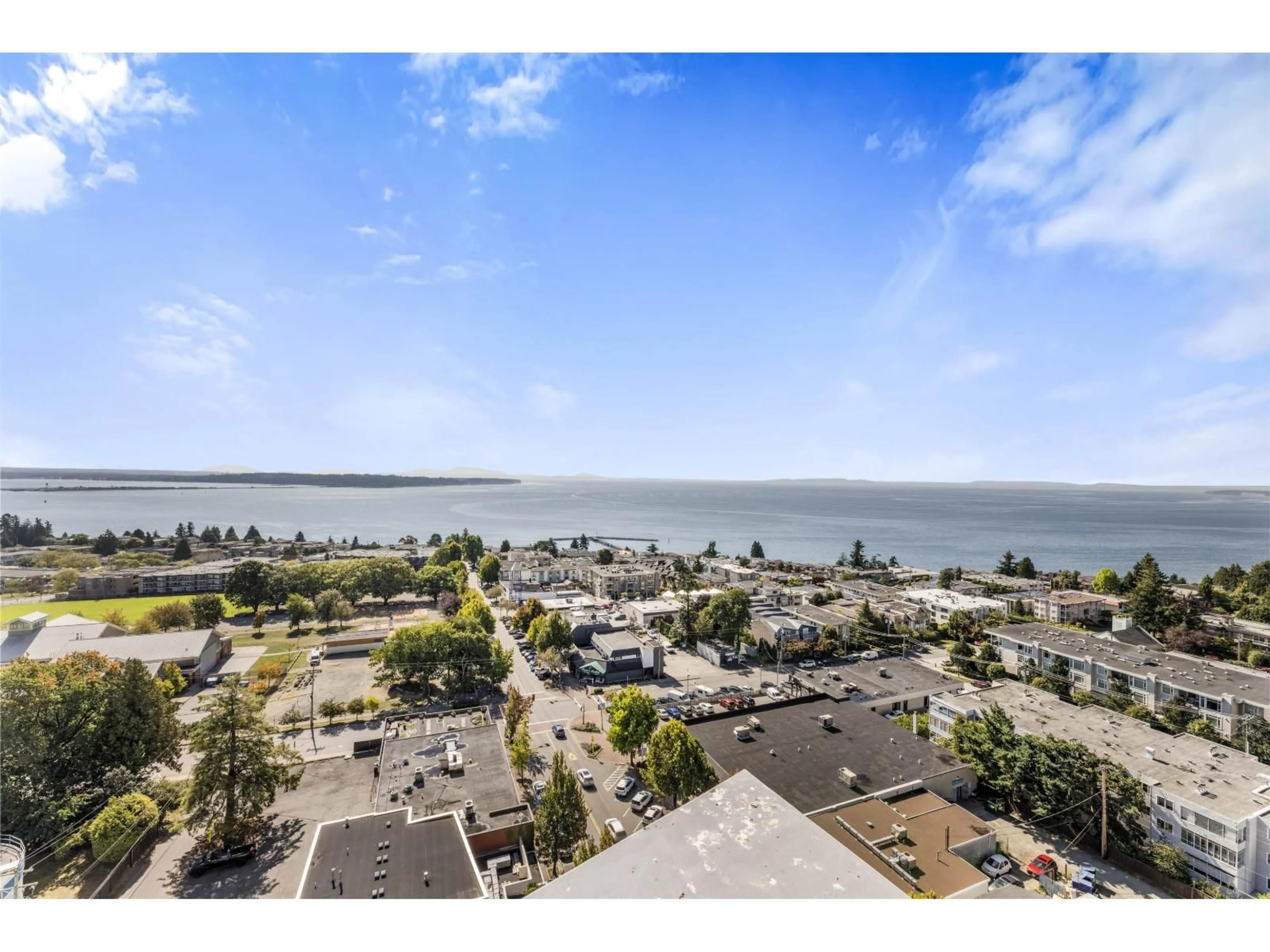 A pic from outside/outdoor area/front of a property/back of a property/a pic from drone, water/lake/river/ocean view for 1302 - 1342 JOHNSTON, White Rock British Columbia V4B0C7
