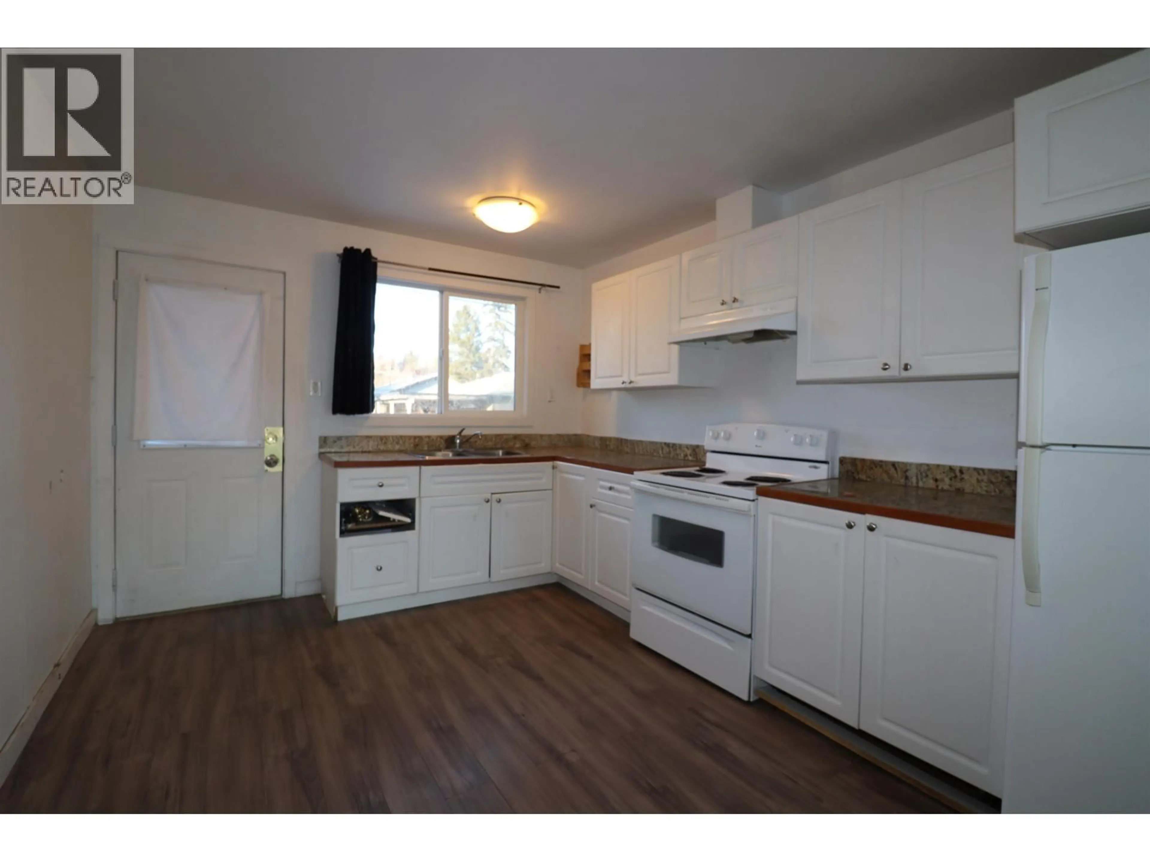 Standard kitchen, wood/laminate floor for 1274 20TH AVENUE, Prince George British Columbia V2L4A9
