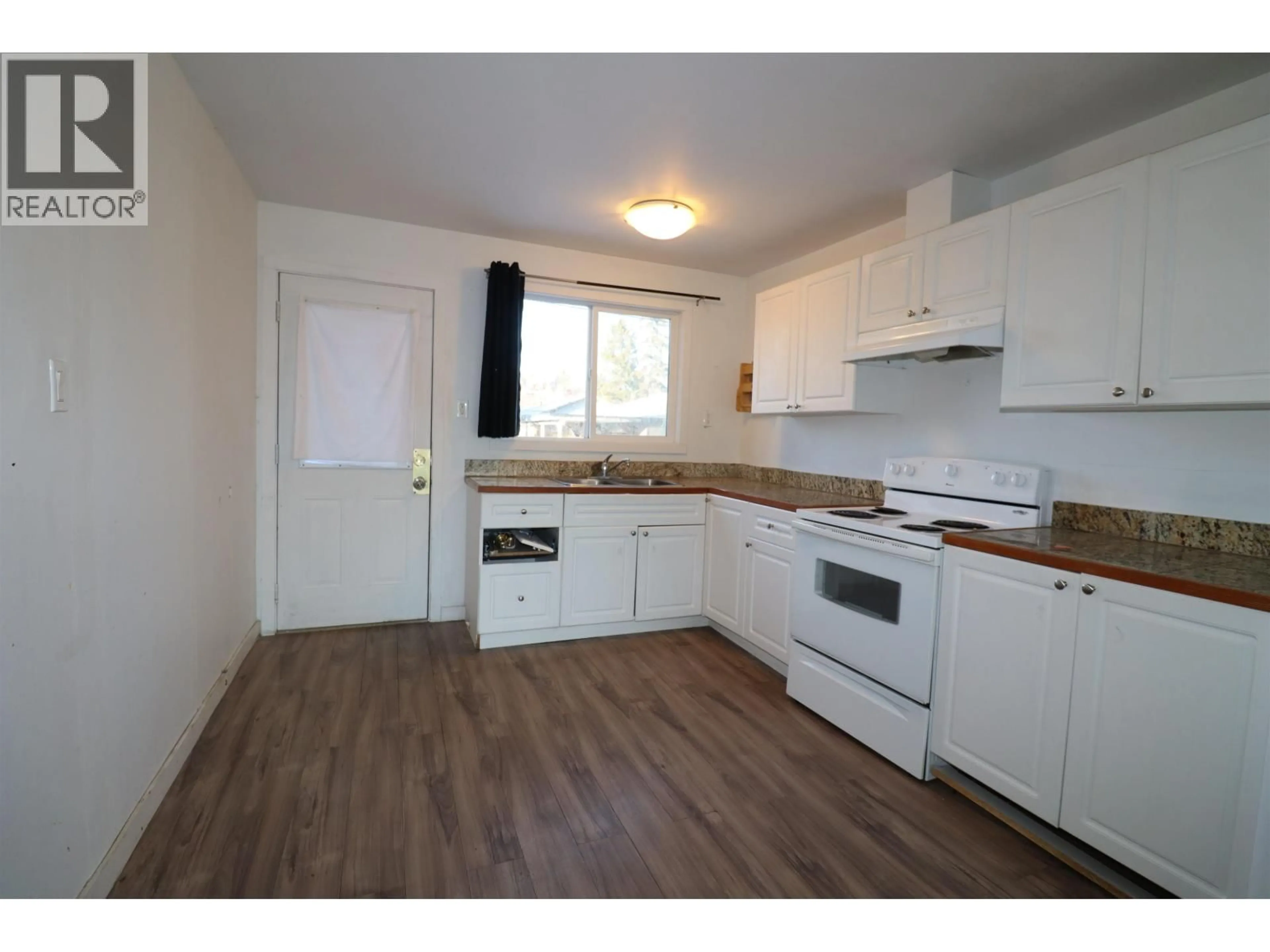 Standard kitchen, wood/laminate floor for 1274 20TH AVENUE, Prince George British Columbia V2L4A9