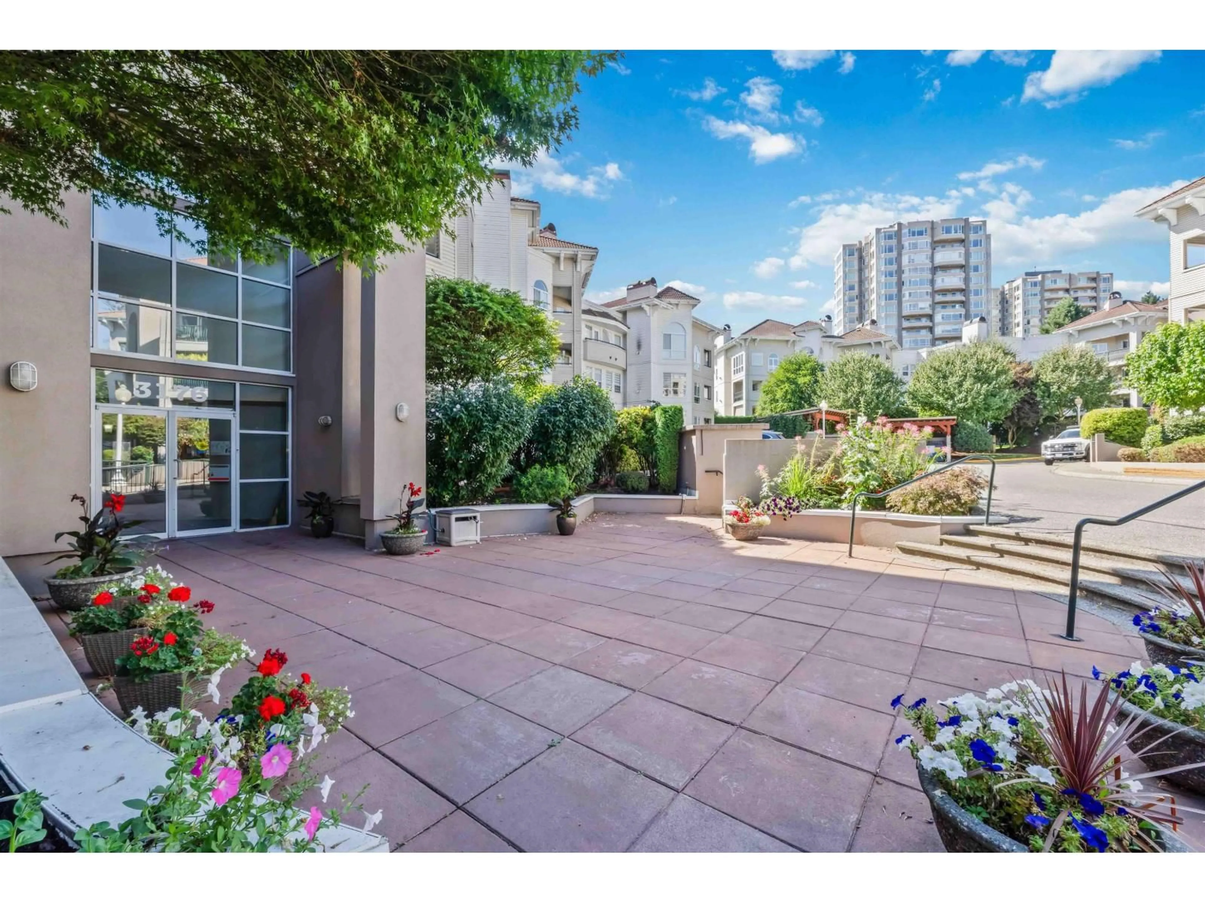 Patio, city buildings view from balcony for 113 - 3176 GLADWIN, Abbotsford British Columbia V2T6R7