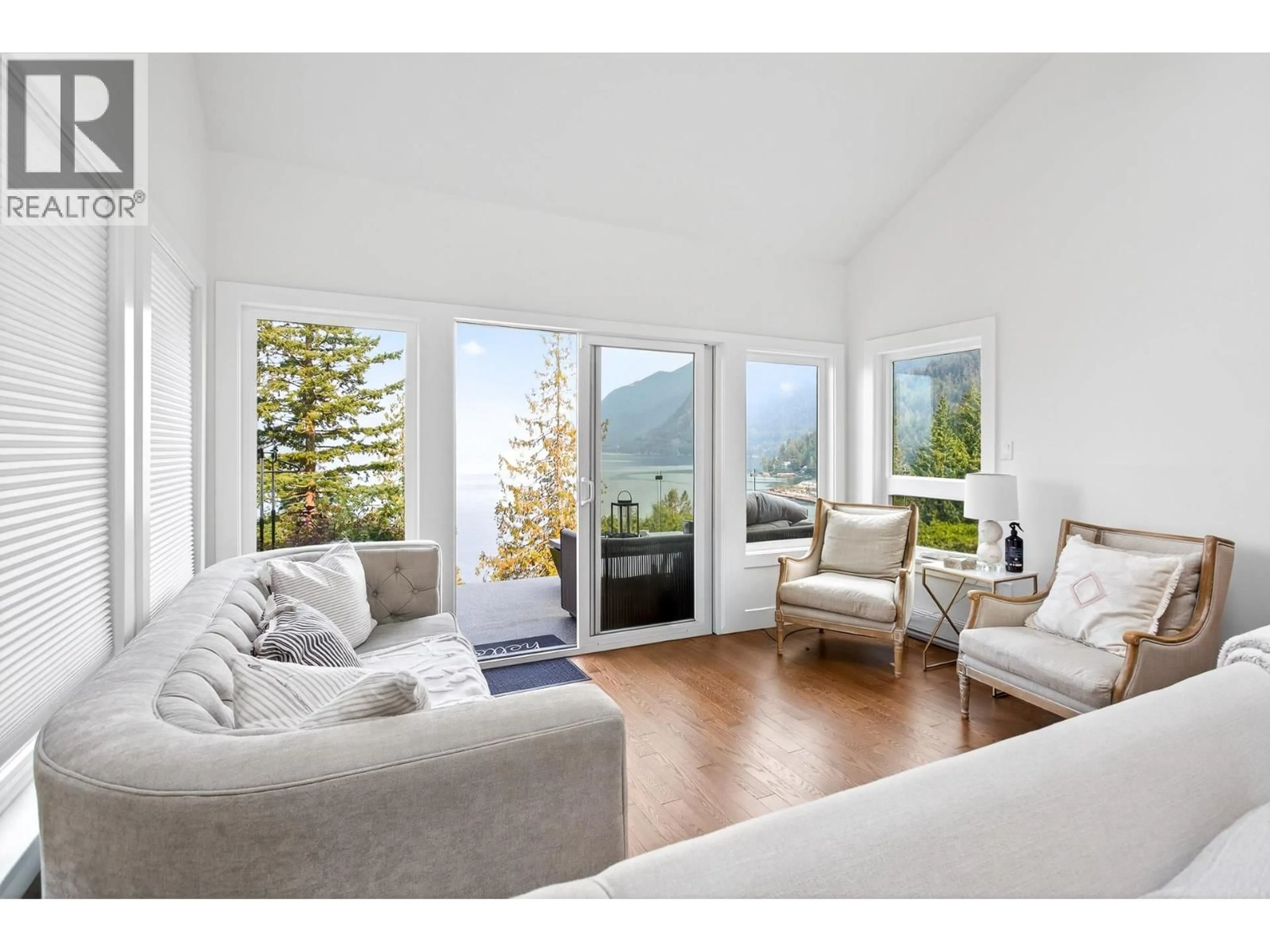 Living room with furniture, wood/laminate floor for 8598 BEDORA PLACE, West Vancouver British Columbia V7W2W4