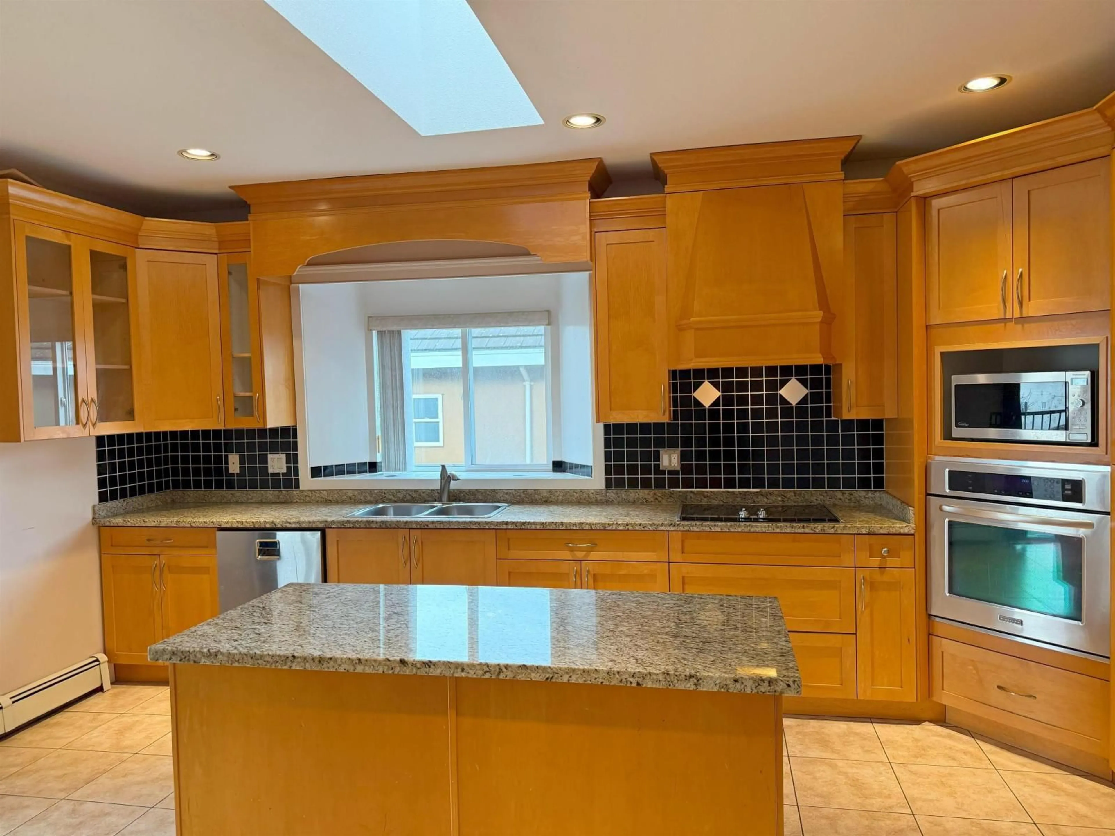 Contemporary kitchen, ceramic/tile floor for 10955 131A, Surrey British Columbia V3T3R8