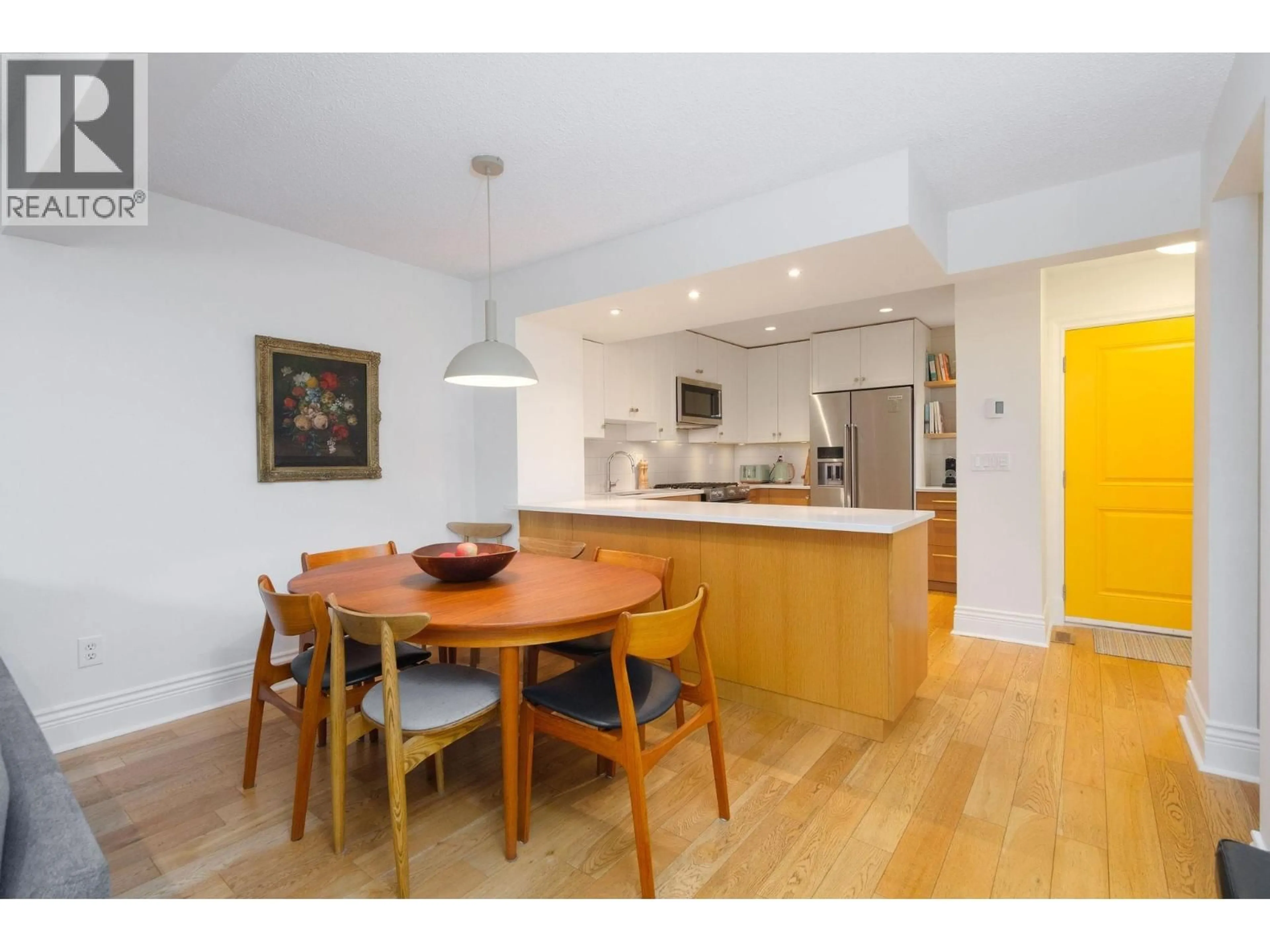 Open concept kitchen, wood/laminate floor for 36 - 1910 CEDAR VILLAGE CRESCENT, North Vancouver British Columbia V7J3M5