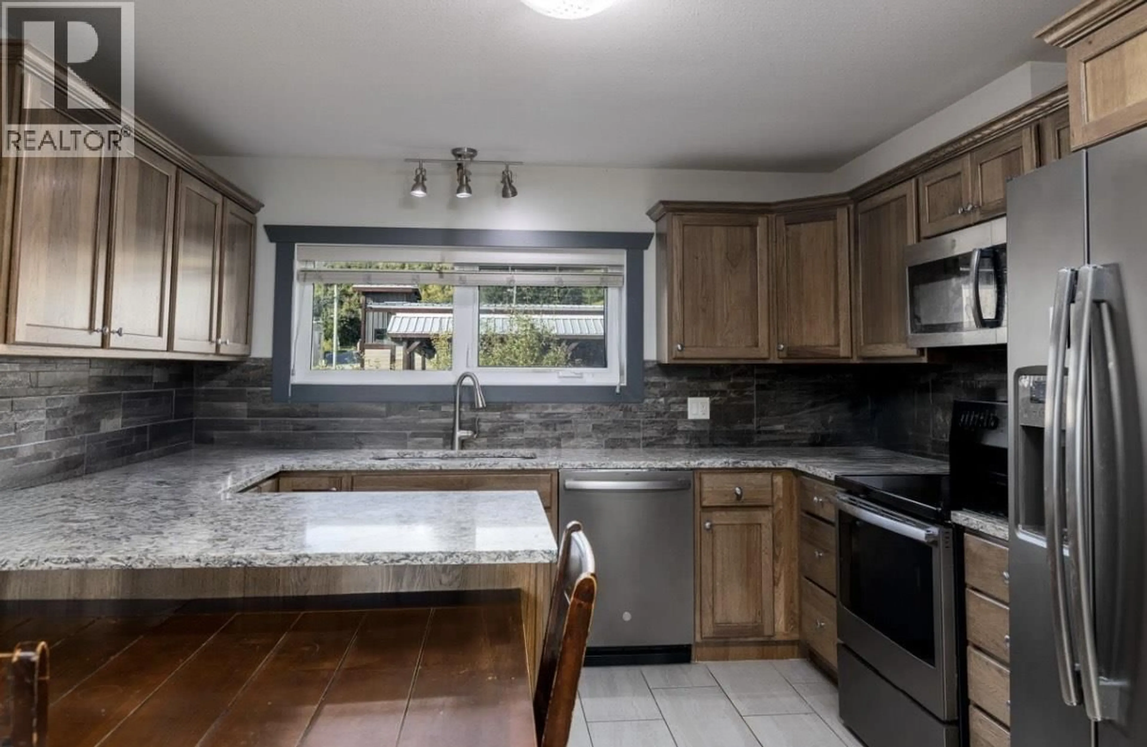 Standard kitchen, ceramic/tile floor for 4427 GREIG AVENUE, Terrace British Columbia V8G1M1