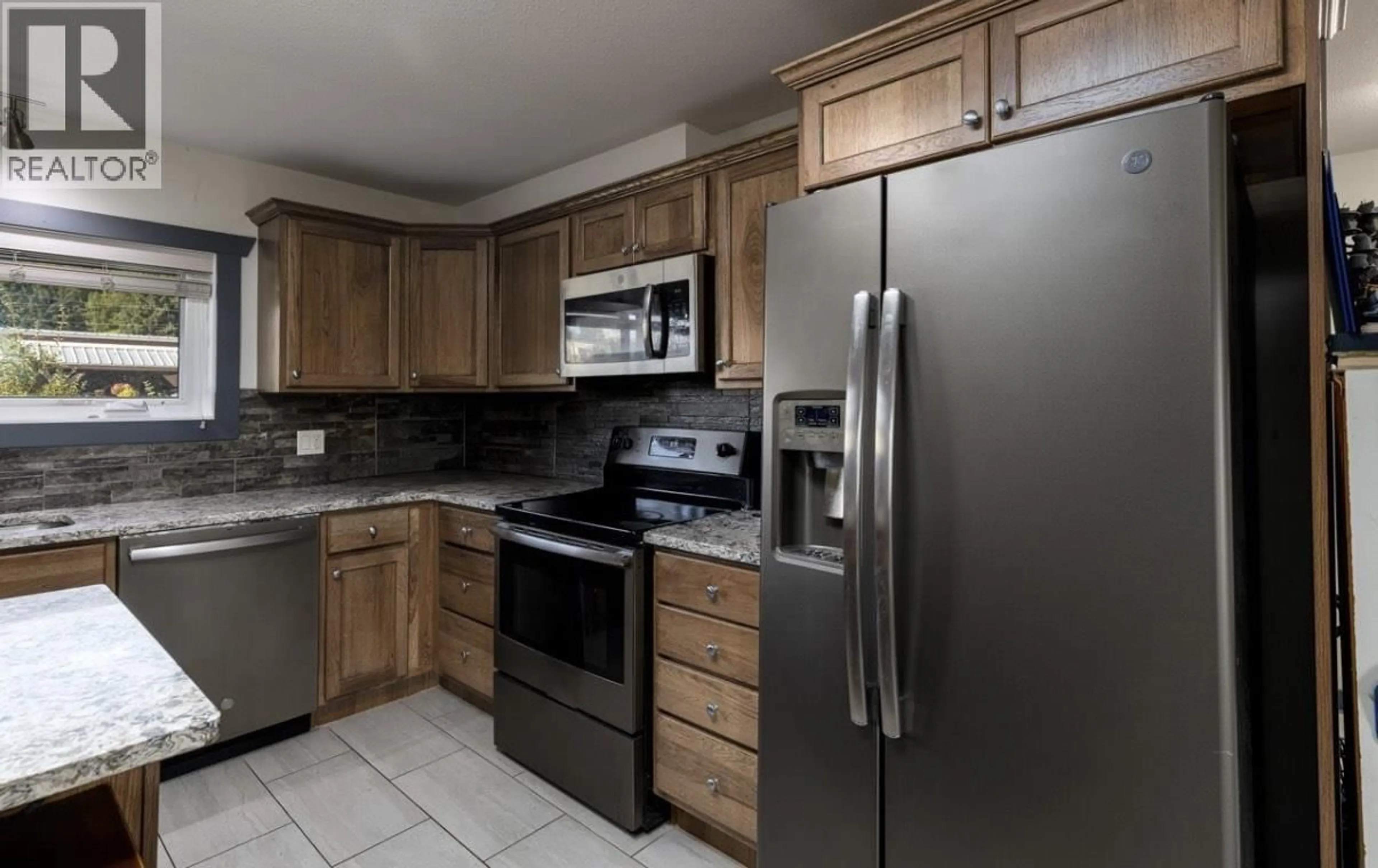 Standard kitchen, ceramic/tile floor for 4427 GREIG AVENUE, Terrace British Columbia V8G1M1