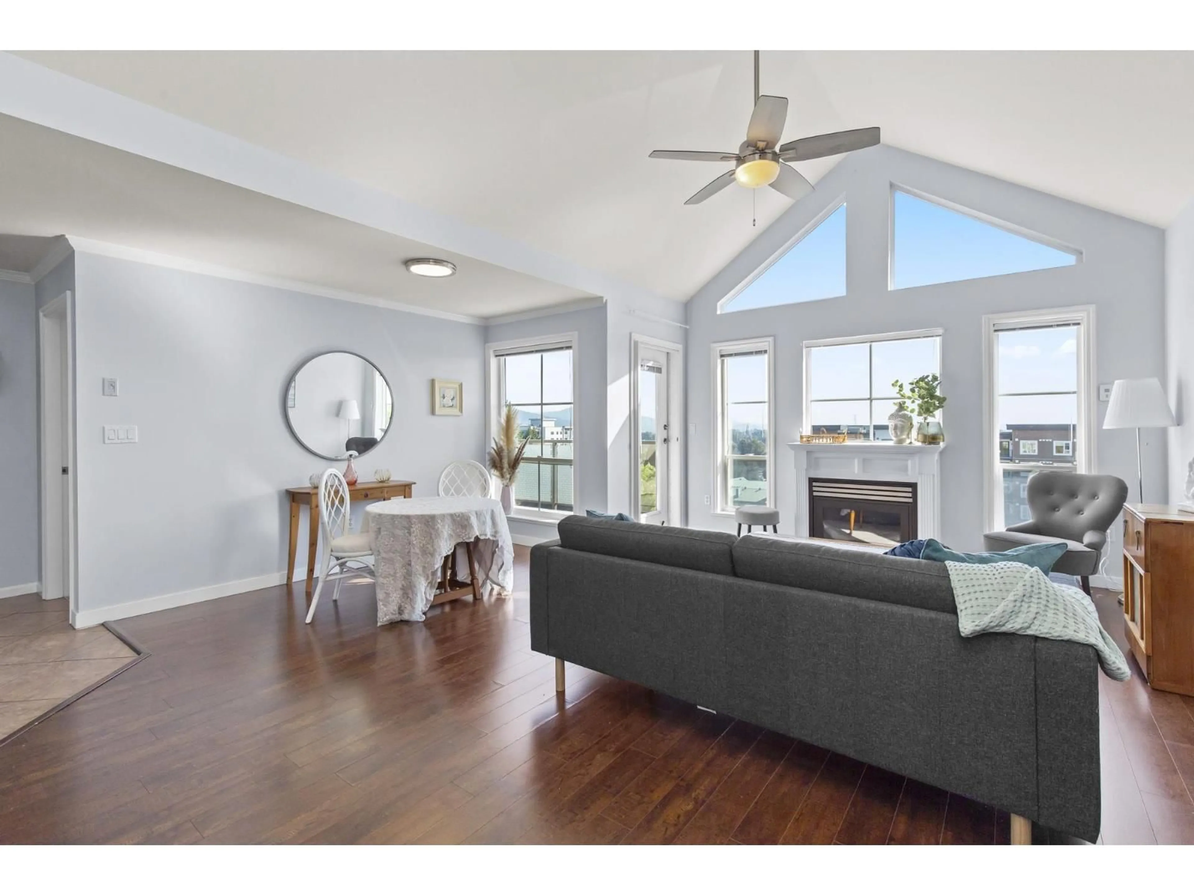 Living room with furniture, wood/laminate floor for 310 - 33150 4, Mission British Columbia V2V7A3