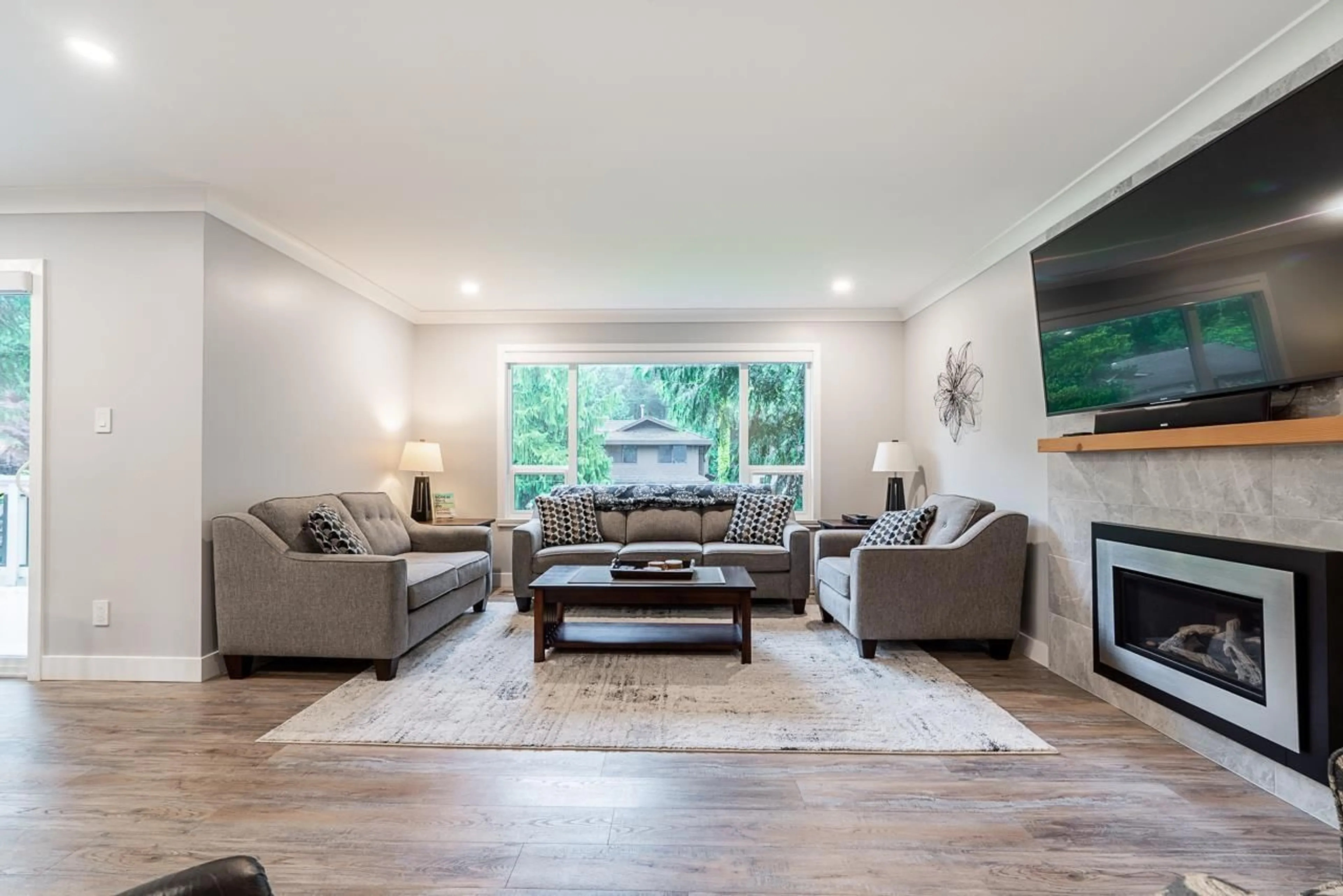 Living room with furniture, wood/laminate floor for 9005 COLLINGS, Delta British Columbia V4C7E8