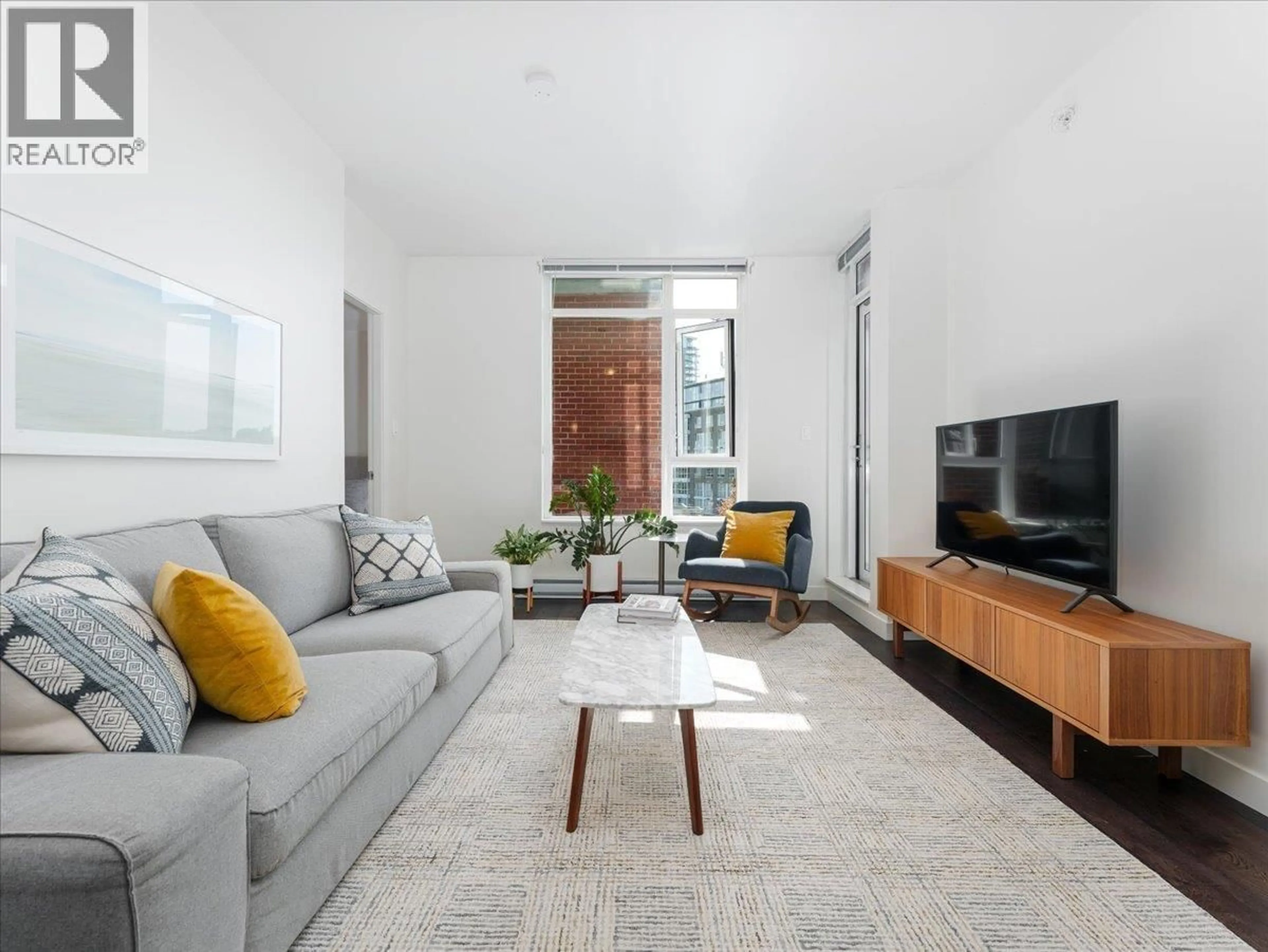 Living room with furniture, unknown for 601 - 2321 SCOTIA STREET, Vancouver British Columbia V5T0A8