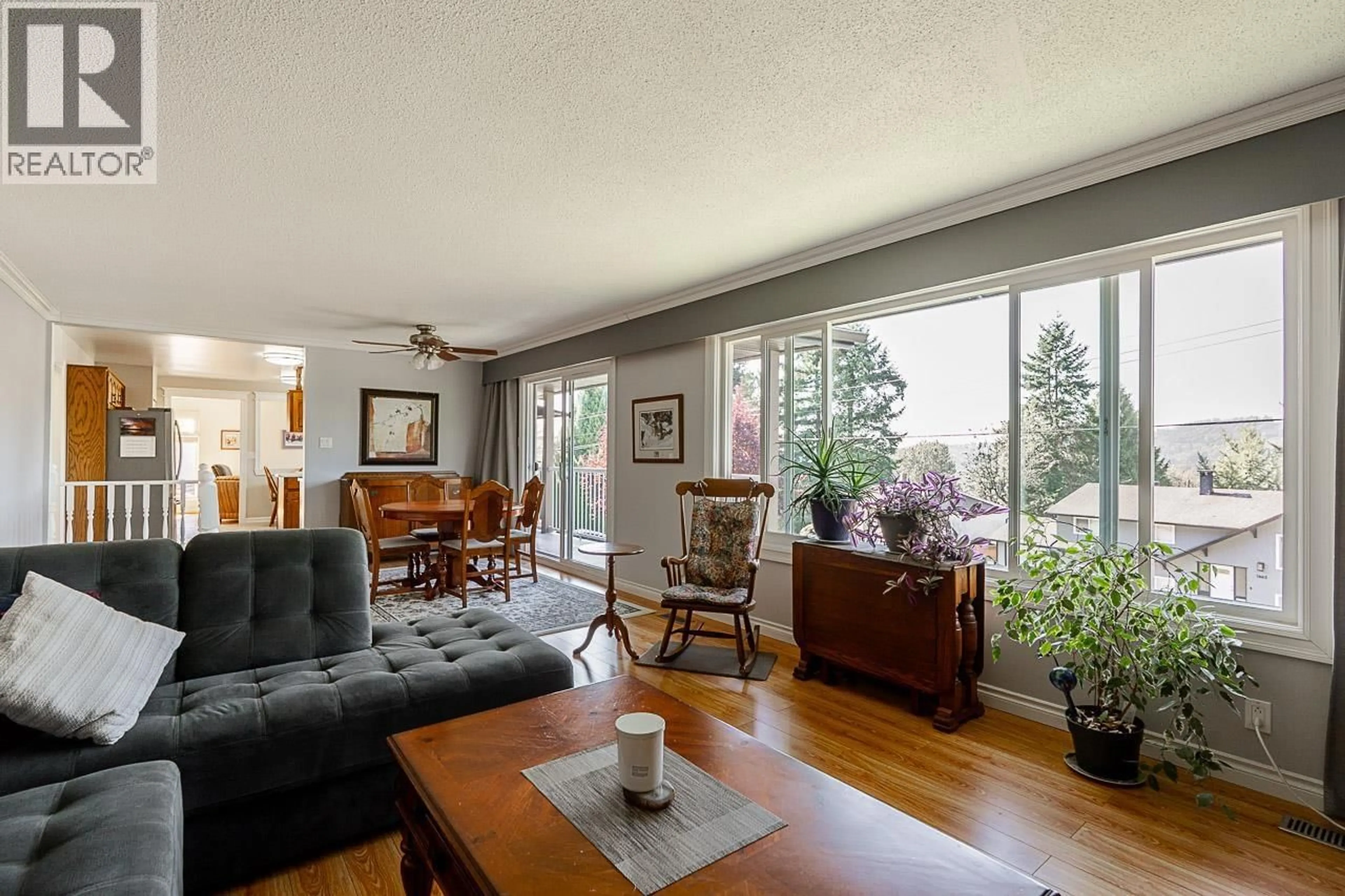 Living room with furniture, wood/laminate floor for 1454 JUNE CRESCENT, Port Coquitlam British Columbia V3C2Y1