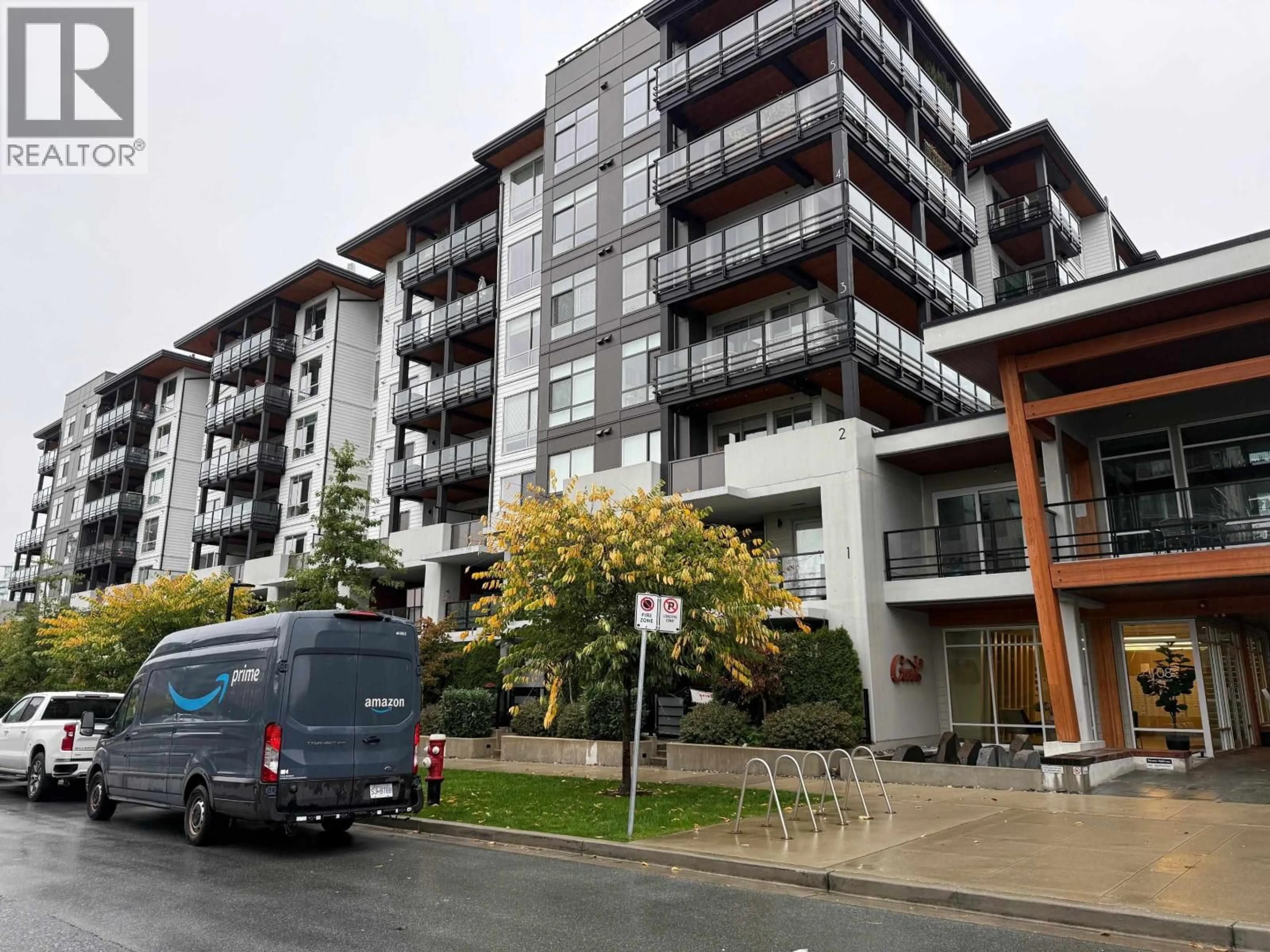A pic from outside/outdoor area/front of a property/back of a property/a pic from drone, unknown for 202 - 108 8TH STREET, North Vancouver British Columbia V7L0H1
