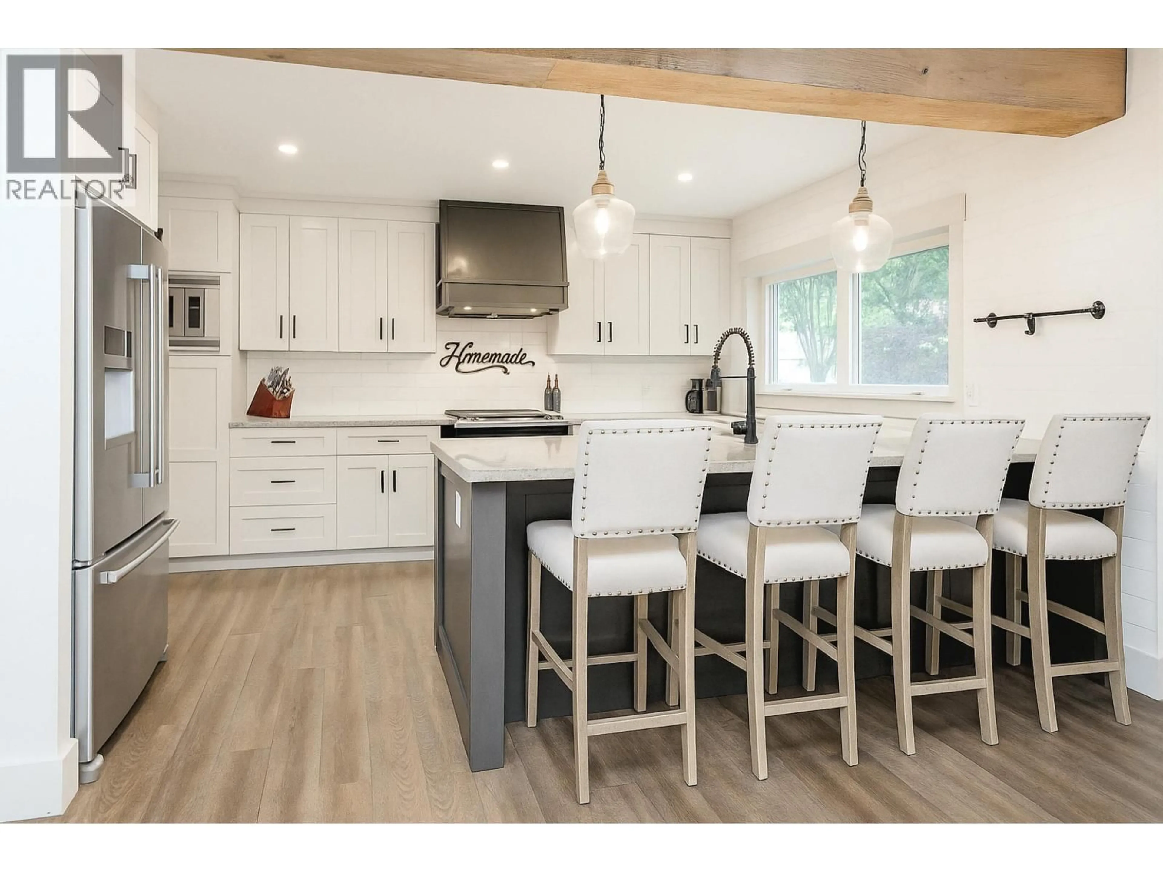 Open concept kitchen, wood/laminate floor for 20831 RIVER ROAD, Maple Ridge British Columbia V2X1Z8