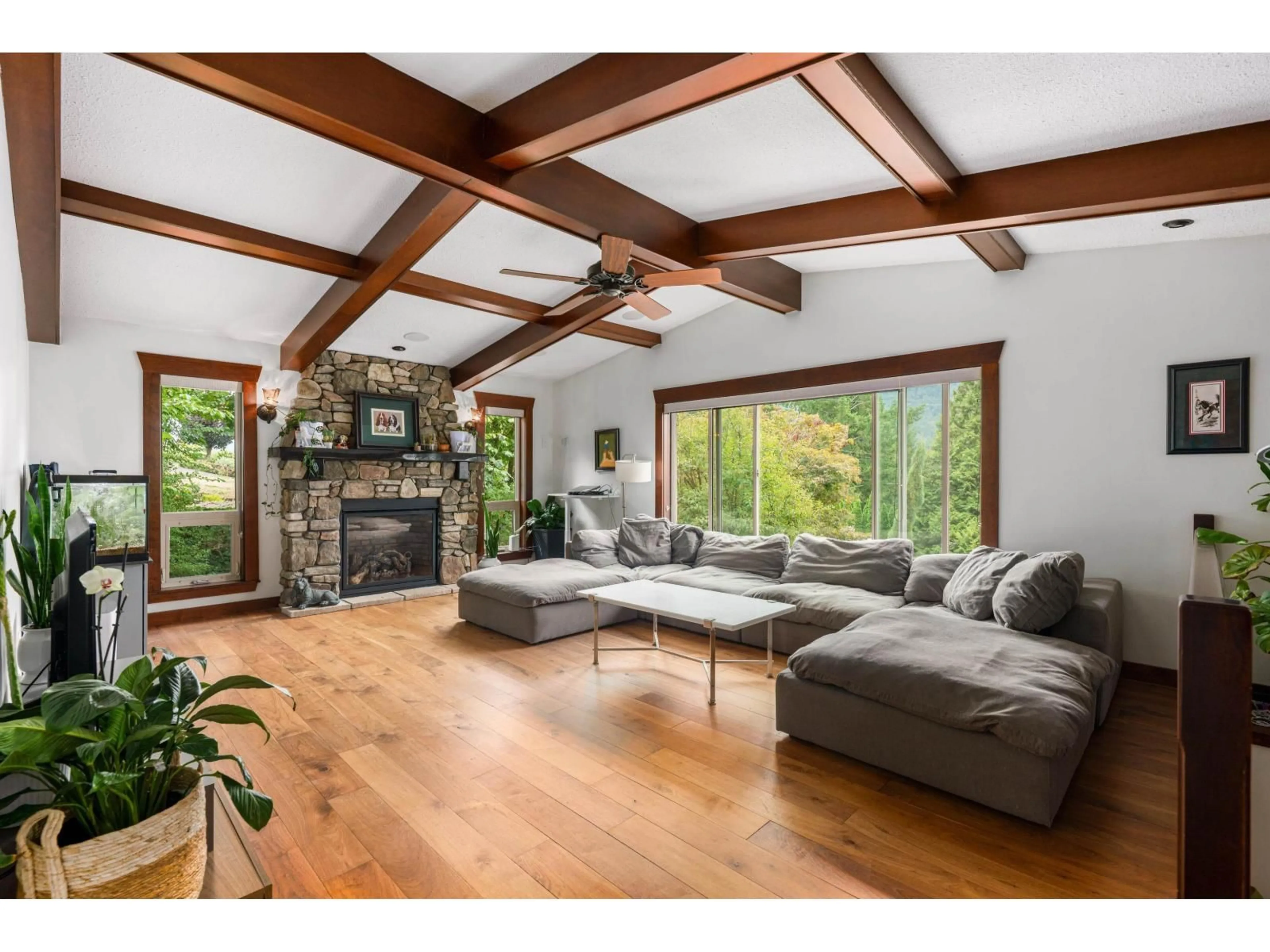 Living room with furniture, wood/laminate floor for 47903 HANSOM ROAD, Chilliwack British Columbia V2R4R9