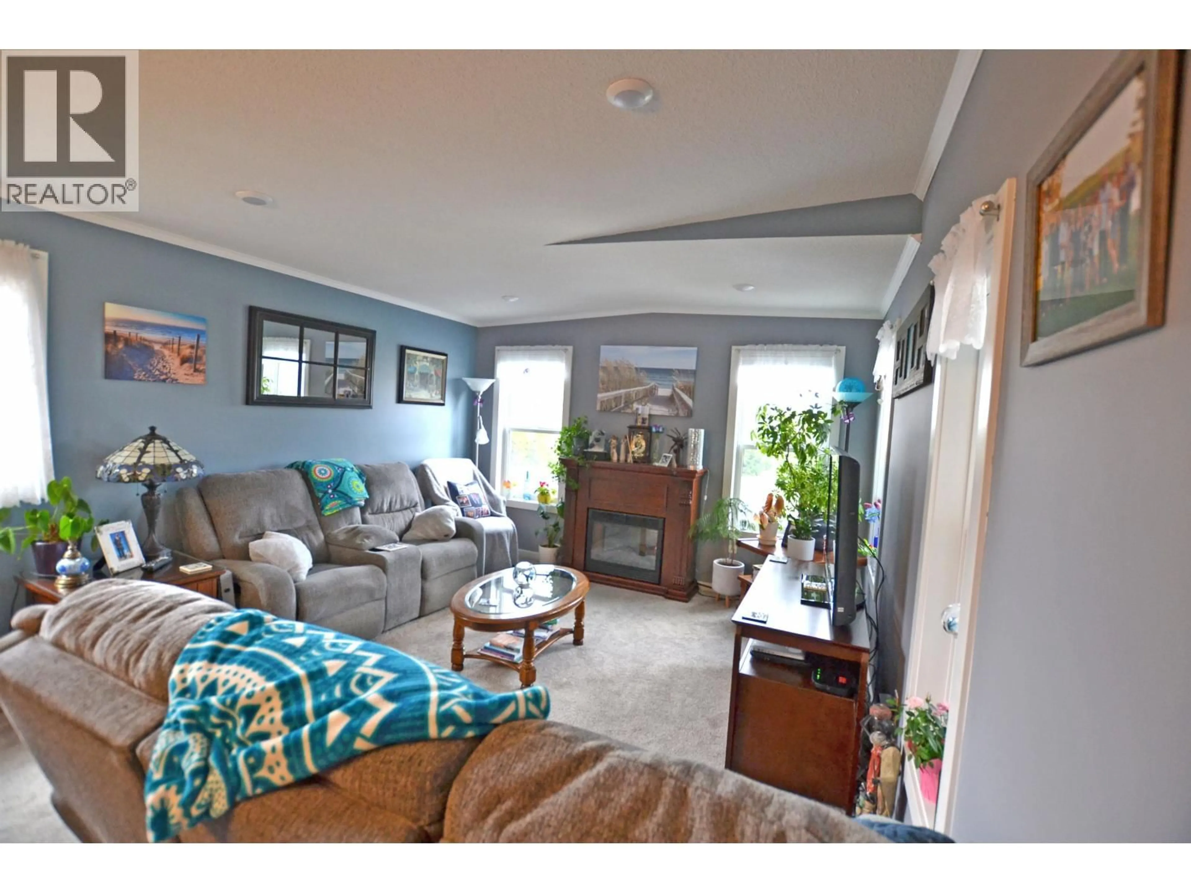 Living room with furniture, unknown for 31 4072 LAC LA HACHE STATION ROAD, 100 Mile House British Columbia V0K1T0